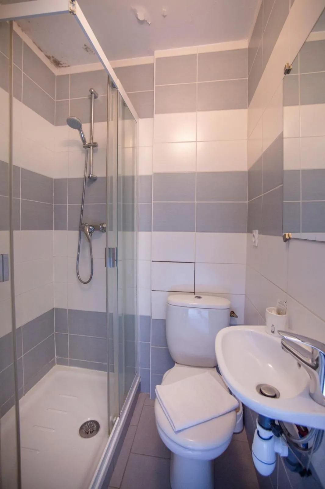 Shower in Appart Hotel Corte HR