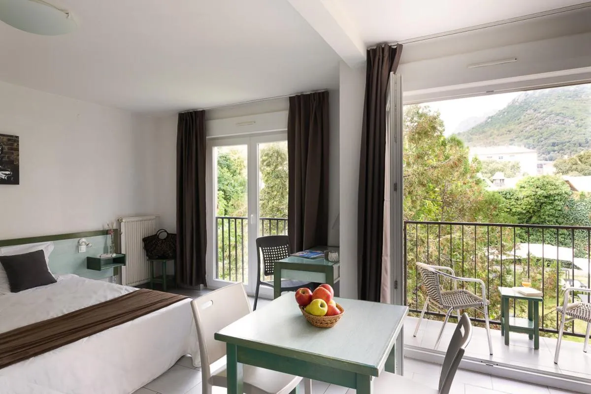 Dining area in Appart Hotel Corte HR