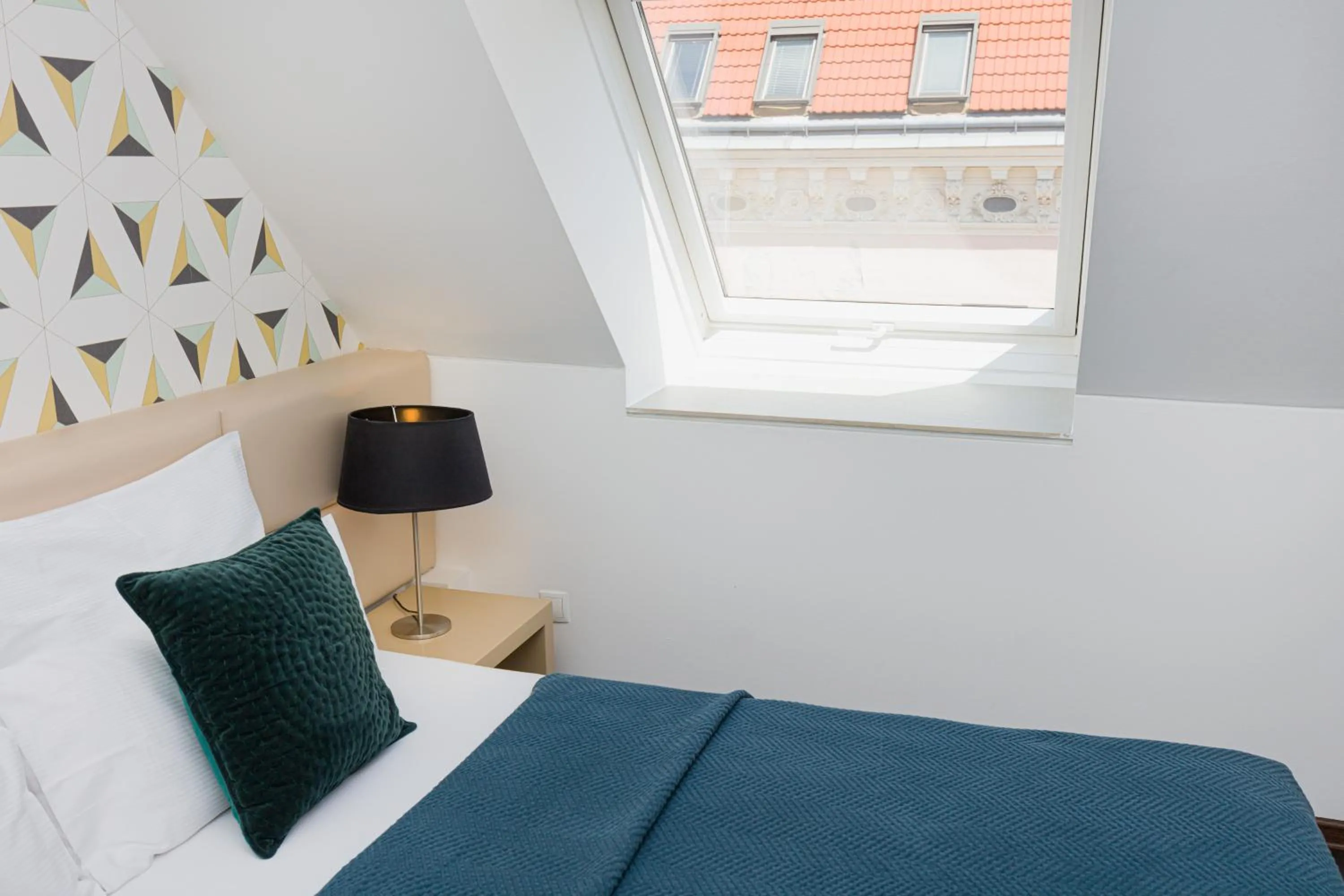 Decorative detail, Bed in RAFAEL KAISER - Premium Apartments - Contactless Check-In