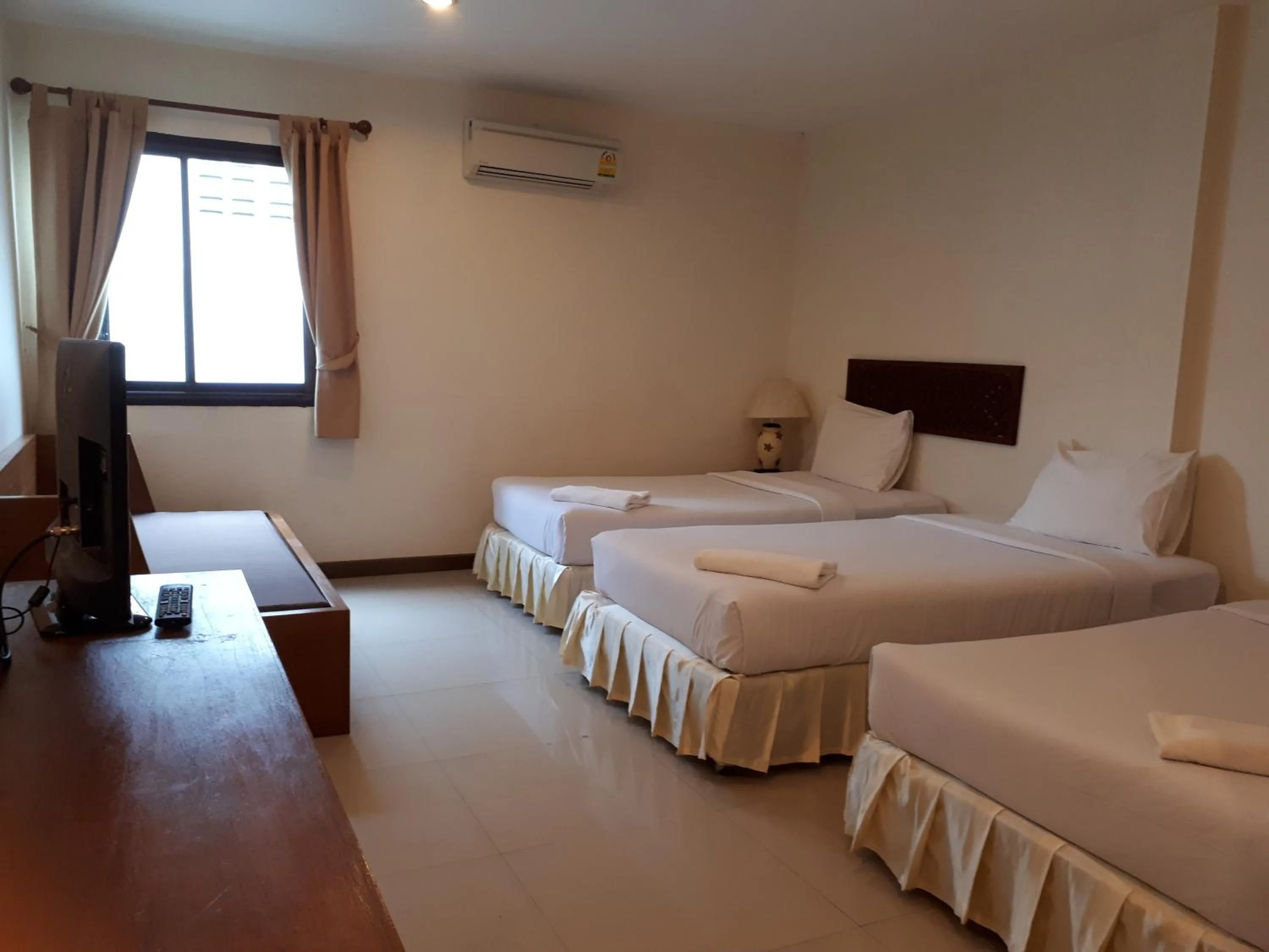 Bed in Nathon Residence Hotelโรงเเรมหน้าทอนเรสซิเด้นท์