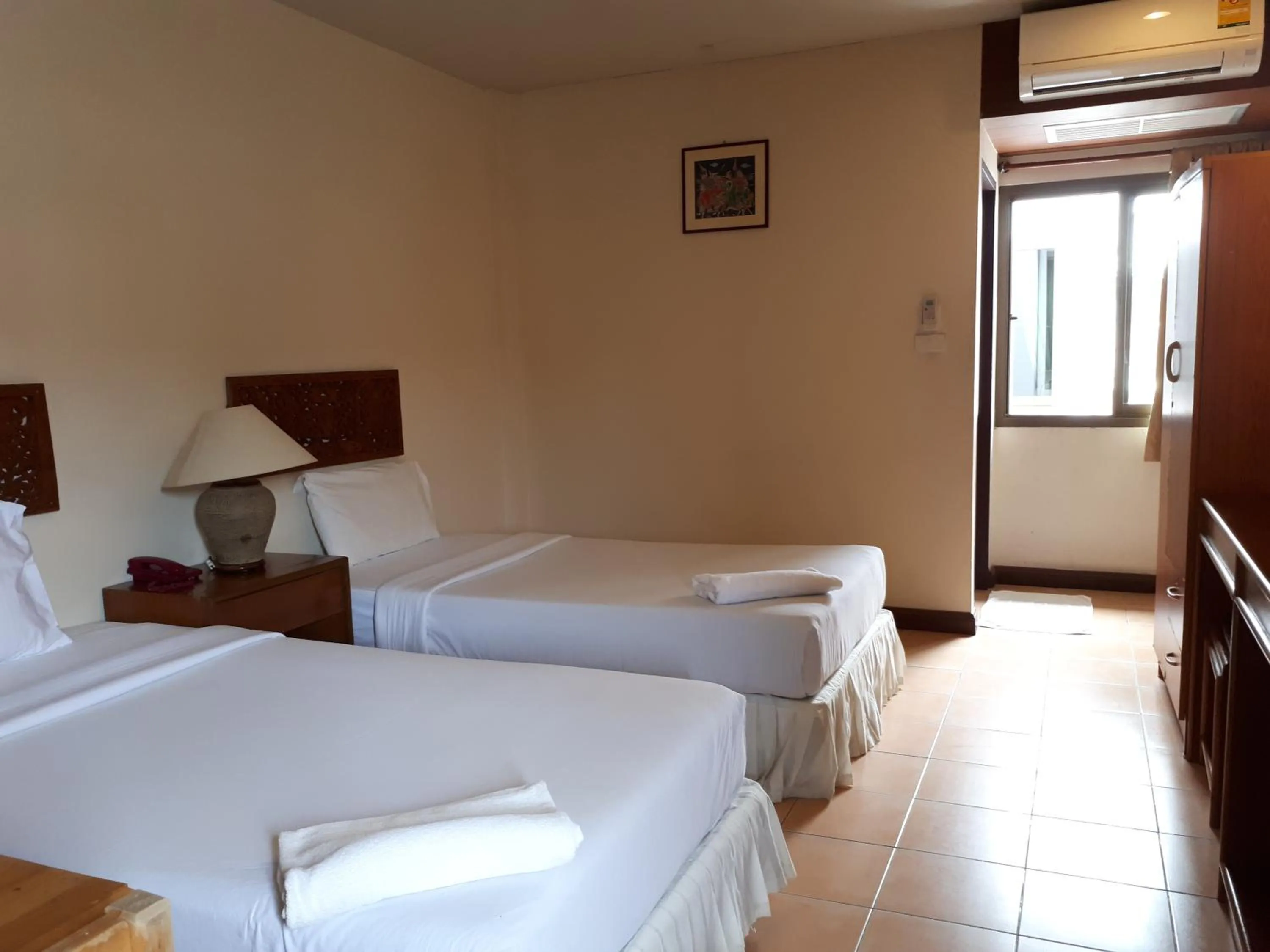 Bed in Nathon Residence Hotelโรงเเรมหน้าทอนเรสซิเด้นท์