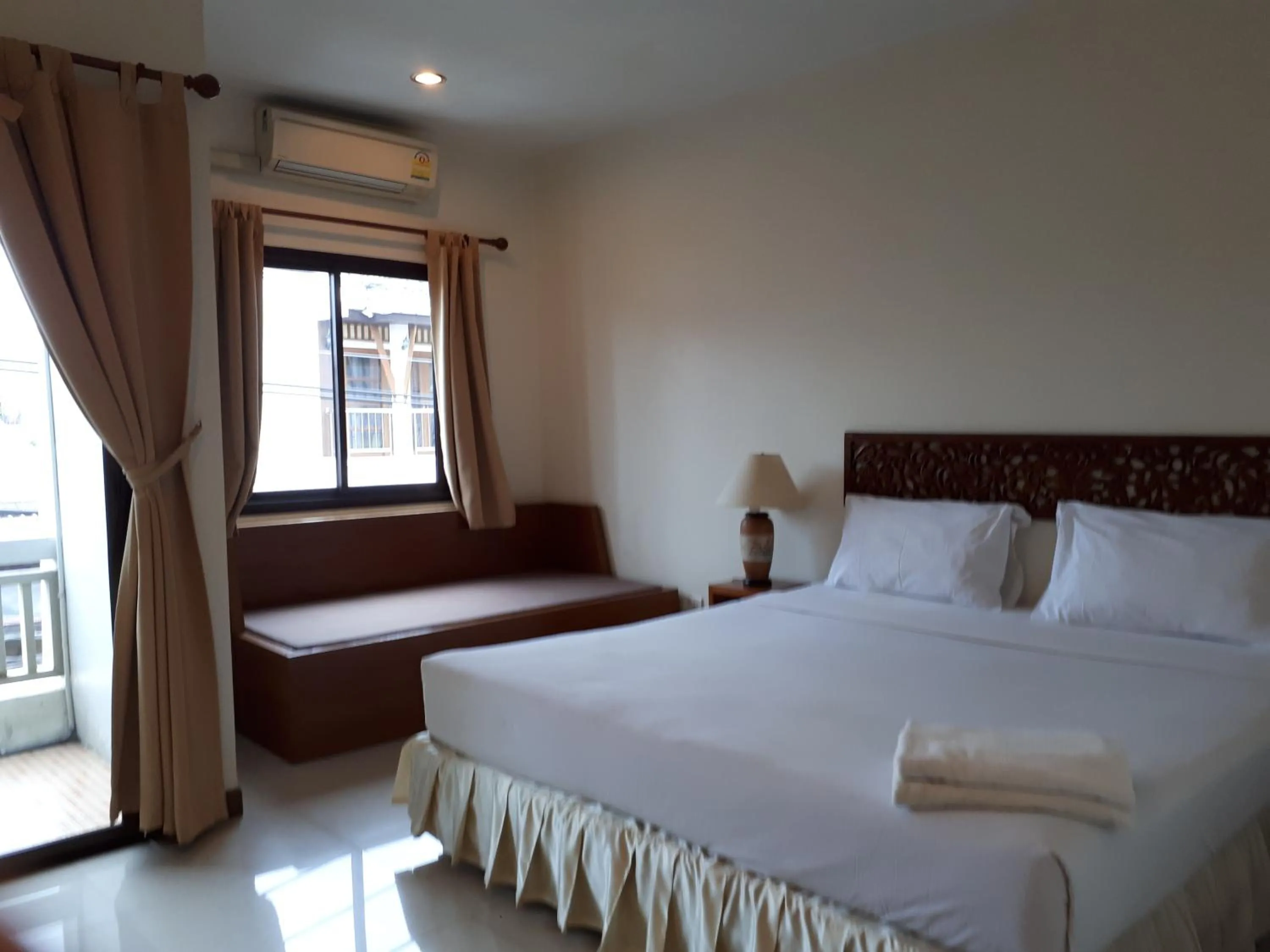 Bed in Nathon Residence Hotelโรงเเรมหน้าทอนเรสซิเด้นท์