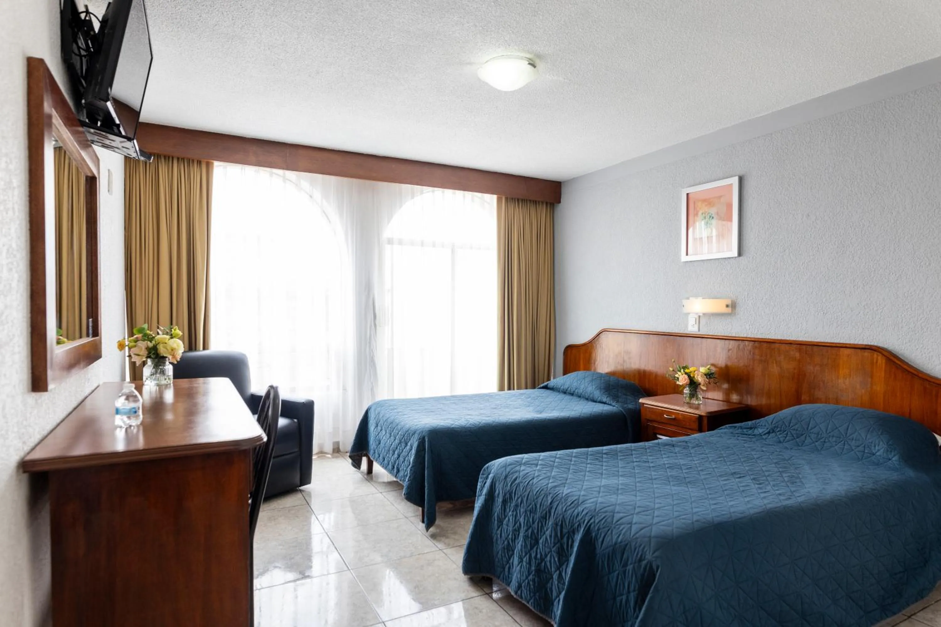 Bed in Hotel Qualitel Plus