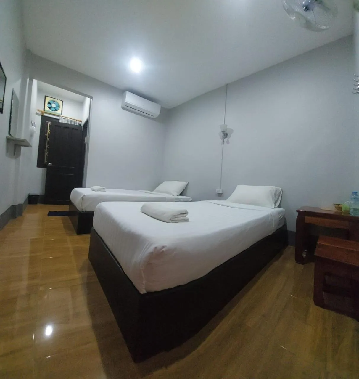 Bed in Phonethavy GUESTHOUSE