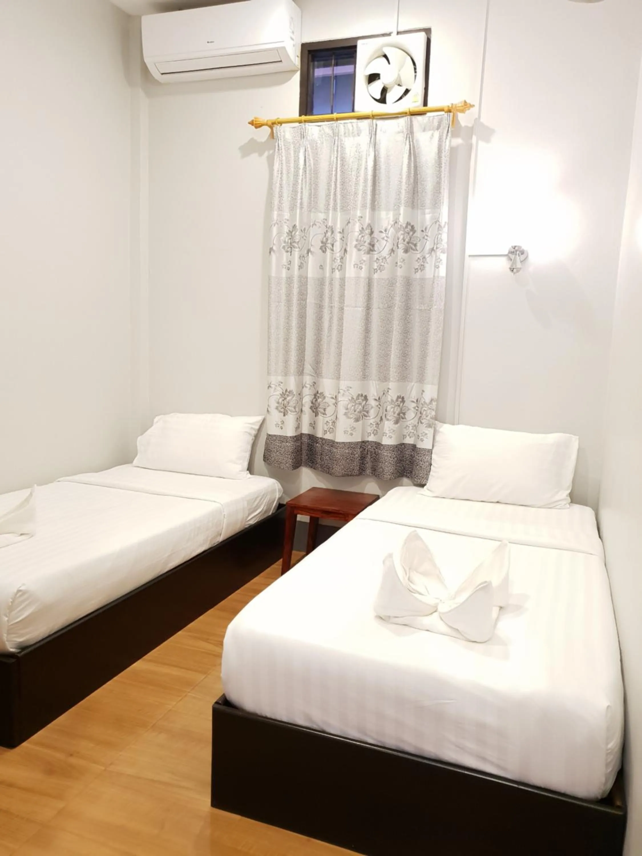 Bed in Phonethavy GUESTHOUSE