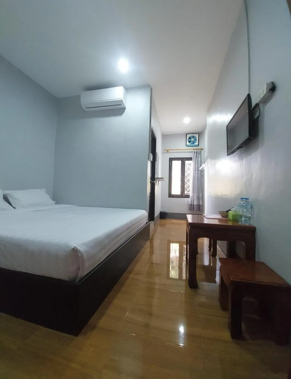 Bed in Phonethavy GUESTHOUSE
