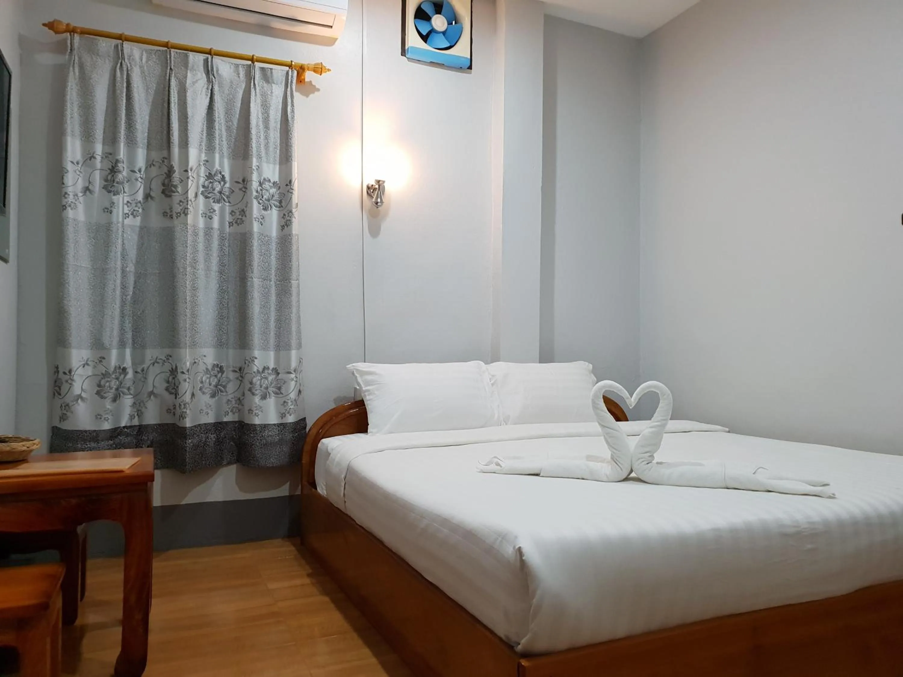 Bed in Phonethavy GUESTHOUSE