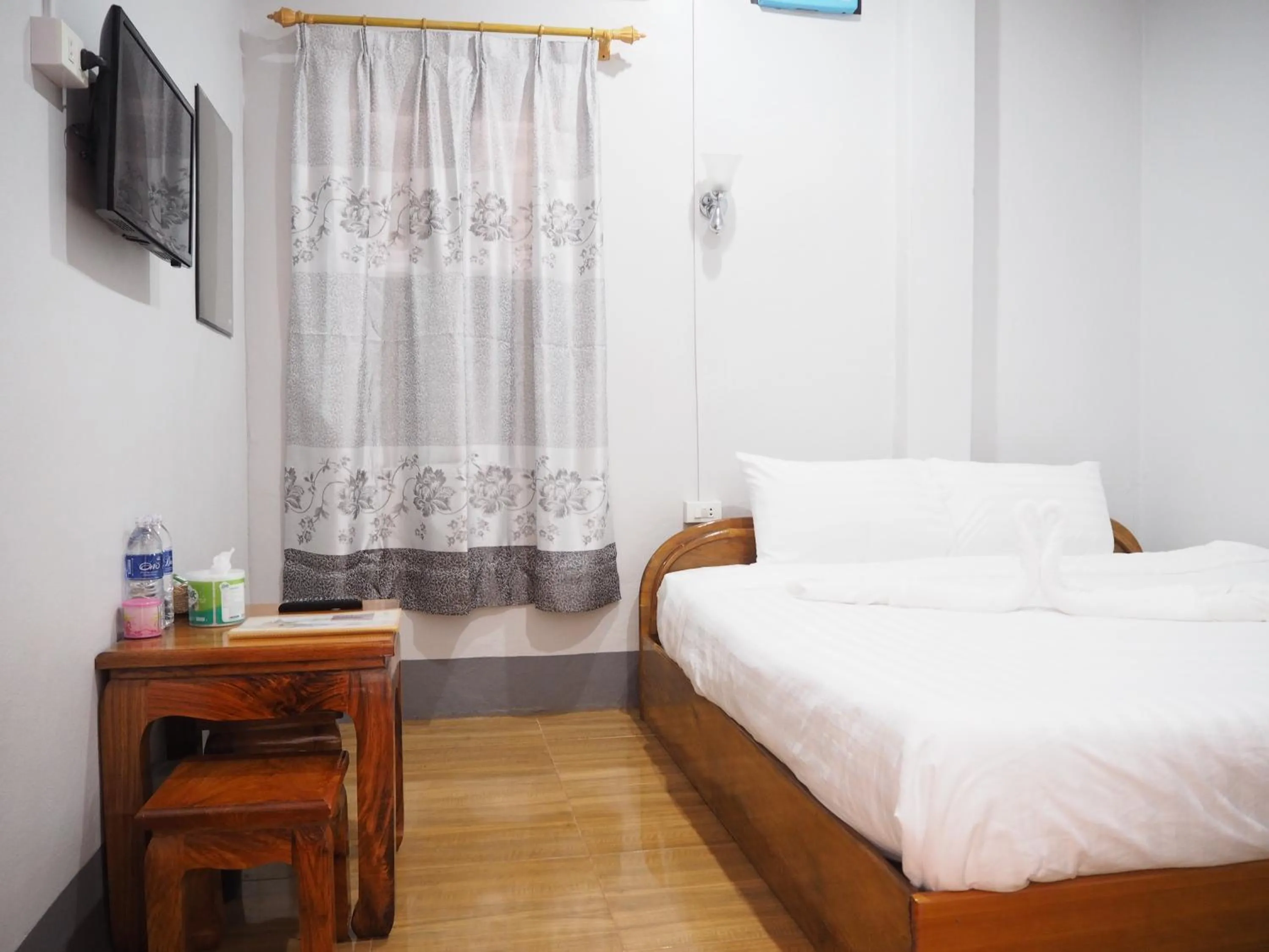 Bed in Phonethavy GUESTHOUSE