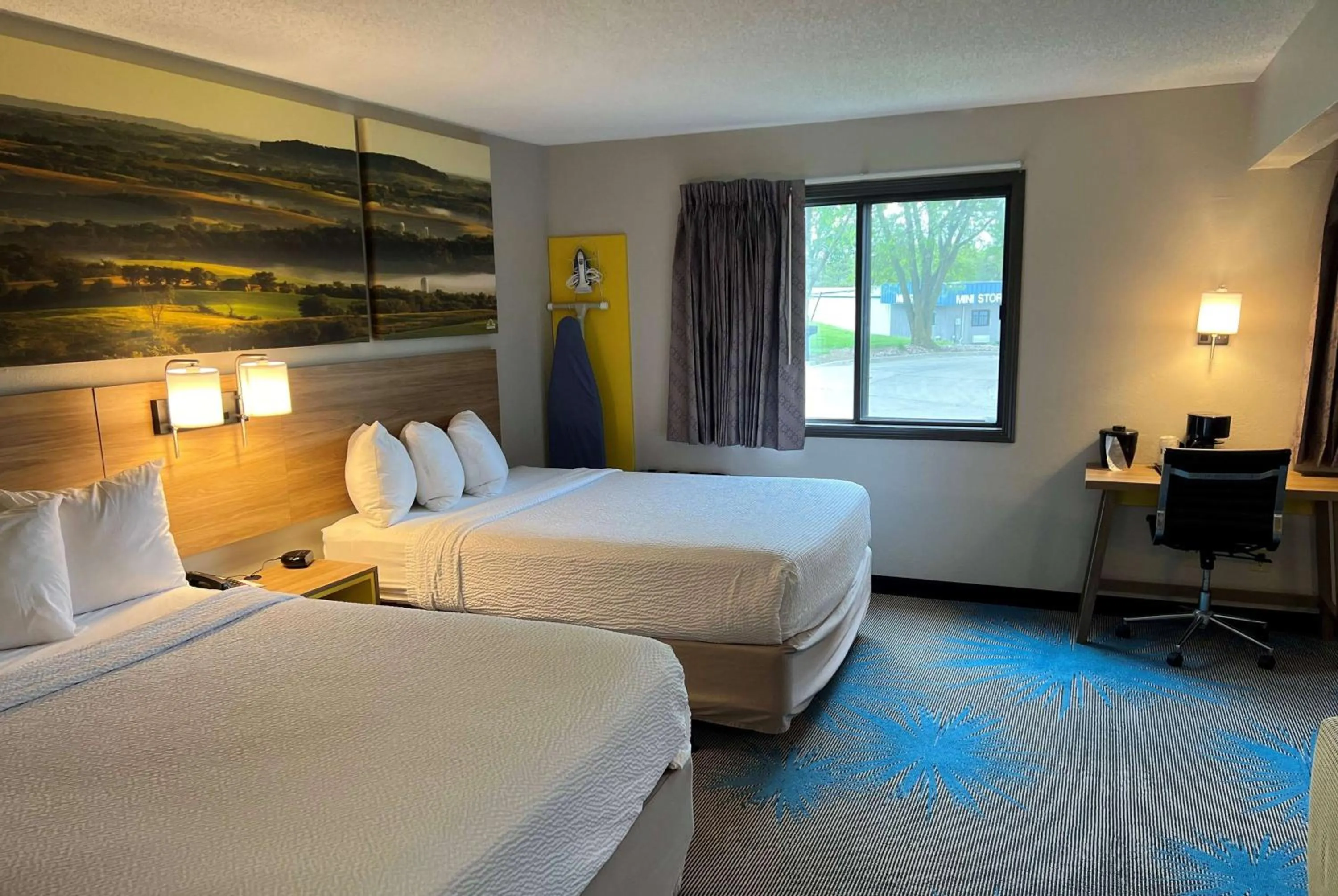 Deluxe Queen Room with Two Queen Beds - Non-Smoking in Days Inn & Suites by Wyndham Des Moines Airport