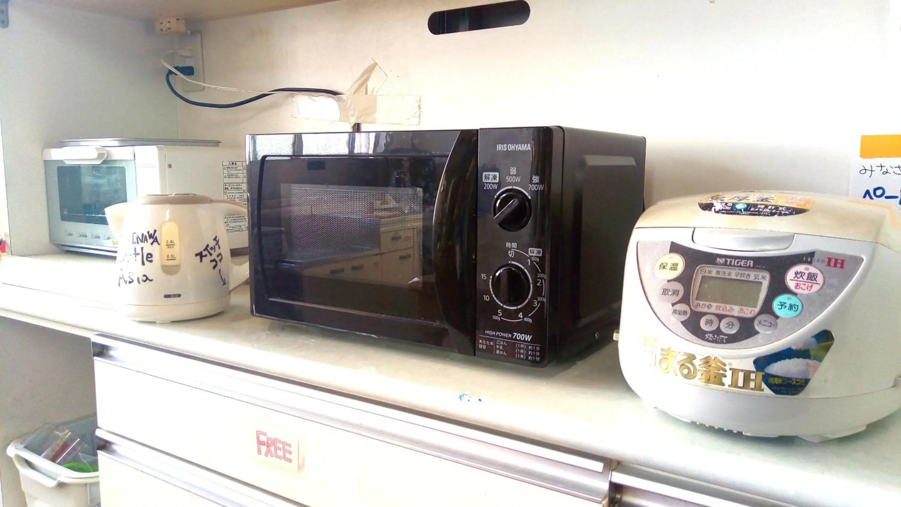 Communal kitchen in Little Asia Guest House