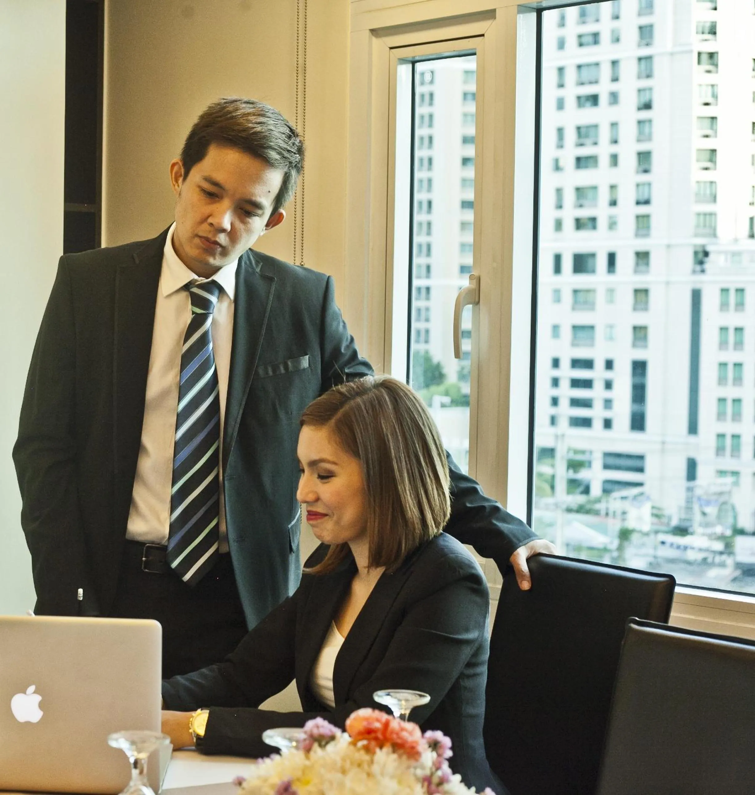 People in The Exchange Regency Residence Hotel Managed by HII