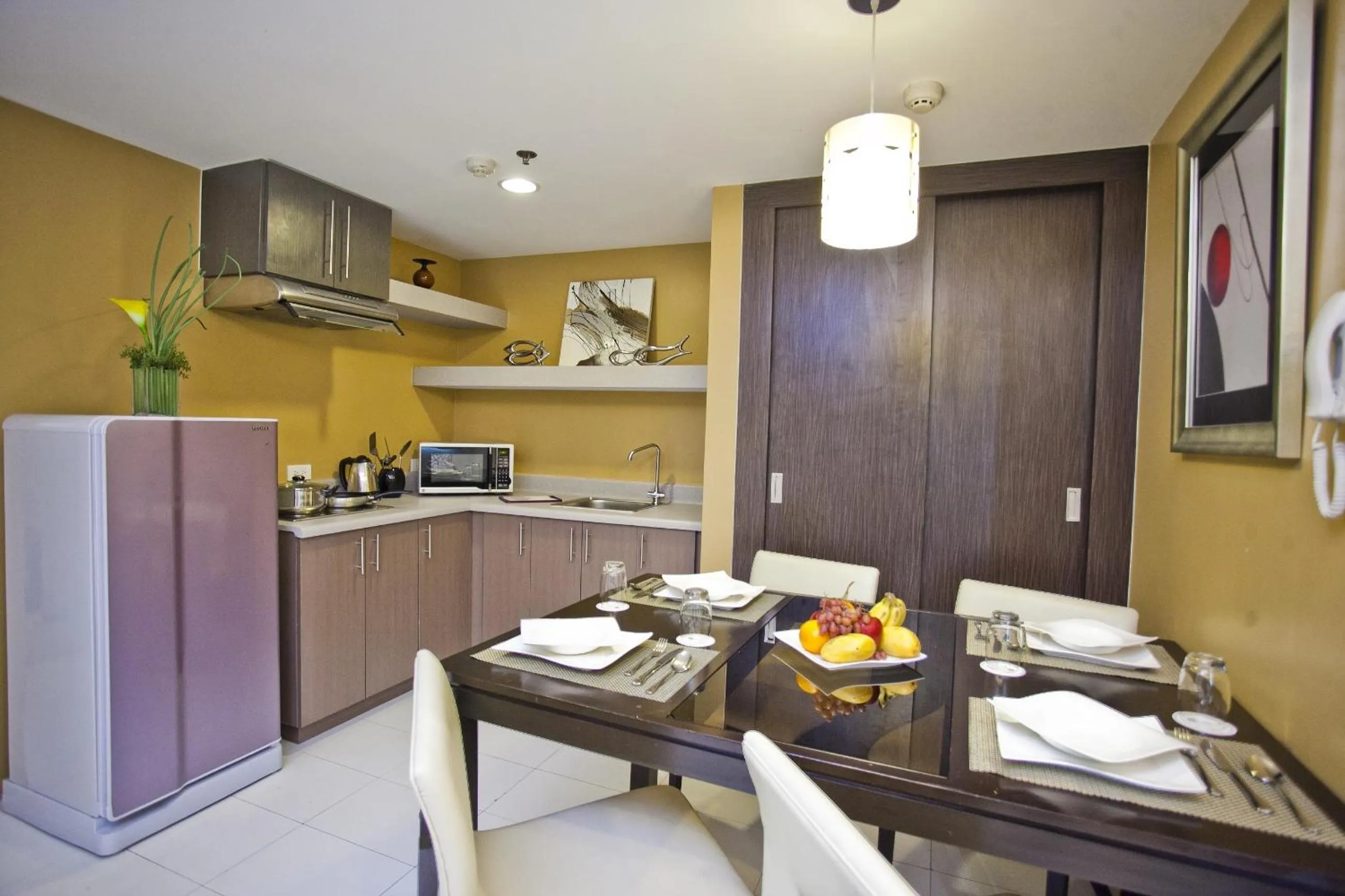Kitchen or kitchenette in The Exchange Regency Residence Hotel Managed by HII