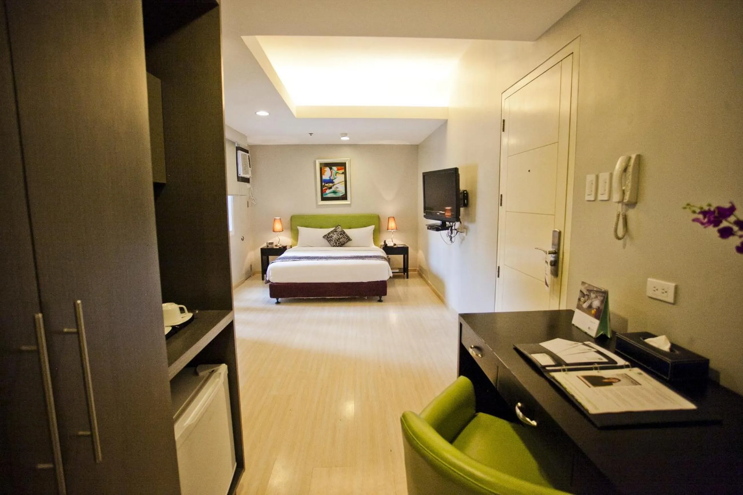 Photo of the whole room, Bed in The Exchange Regency Residence Hotel Managed by HII