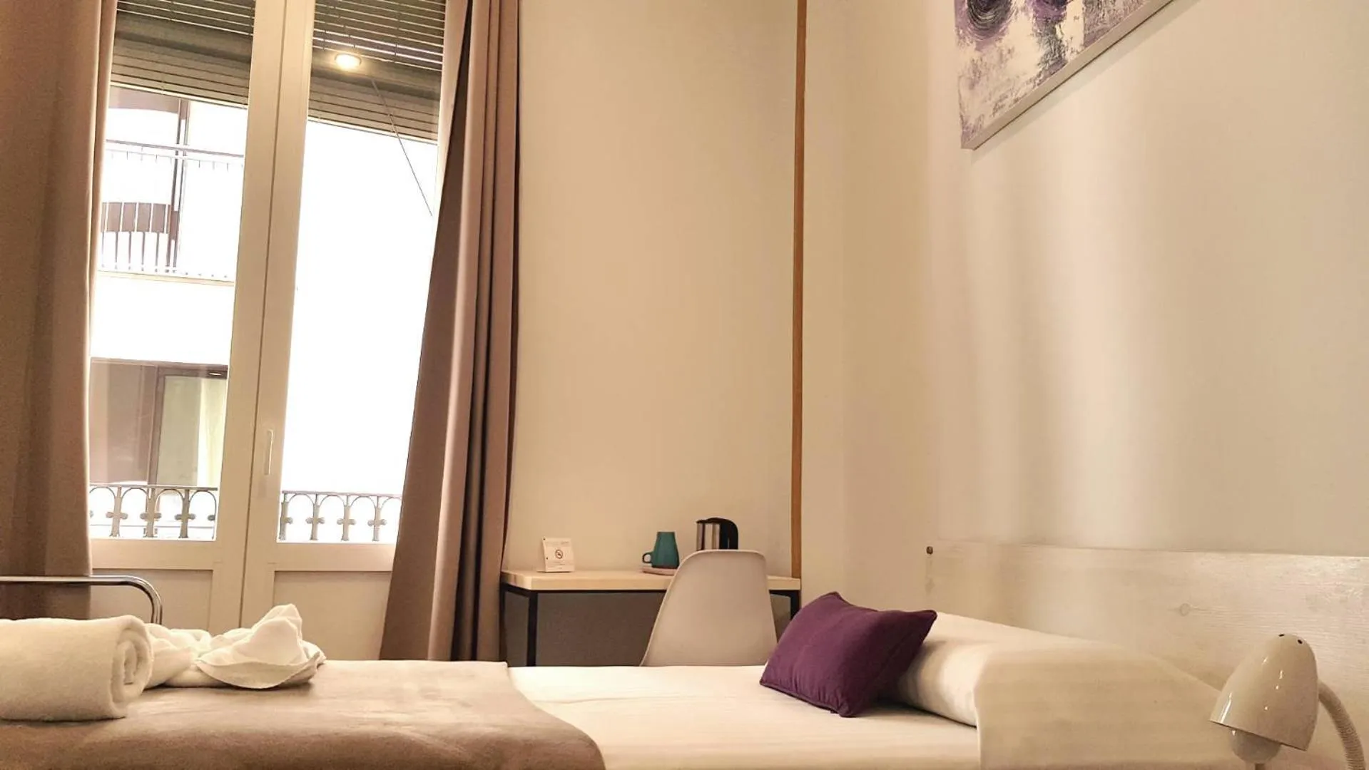 Photo of the whole room, Bed in Hostal la Palmera