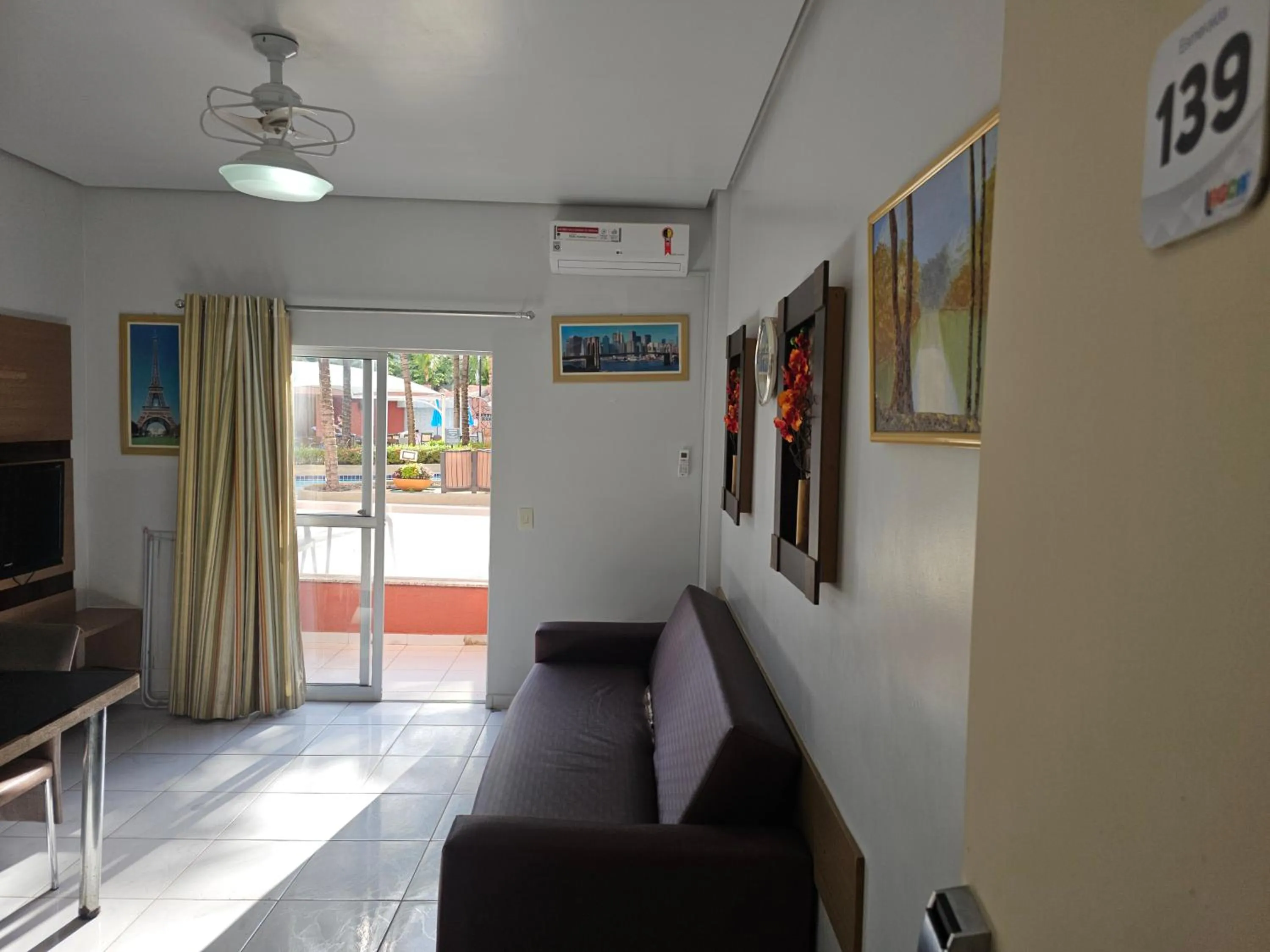 Seating area in PARQUE AQUÁTICO Lagoa Quente, à 50m, entrada + barata, apto particular