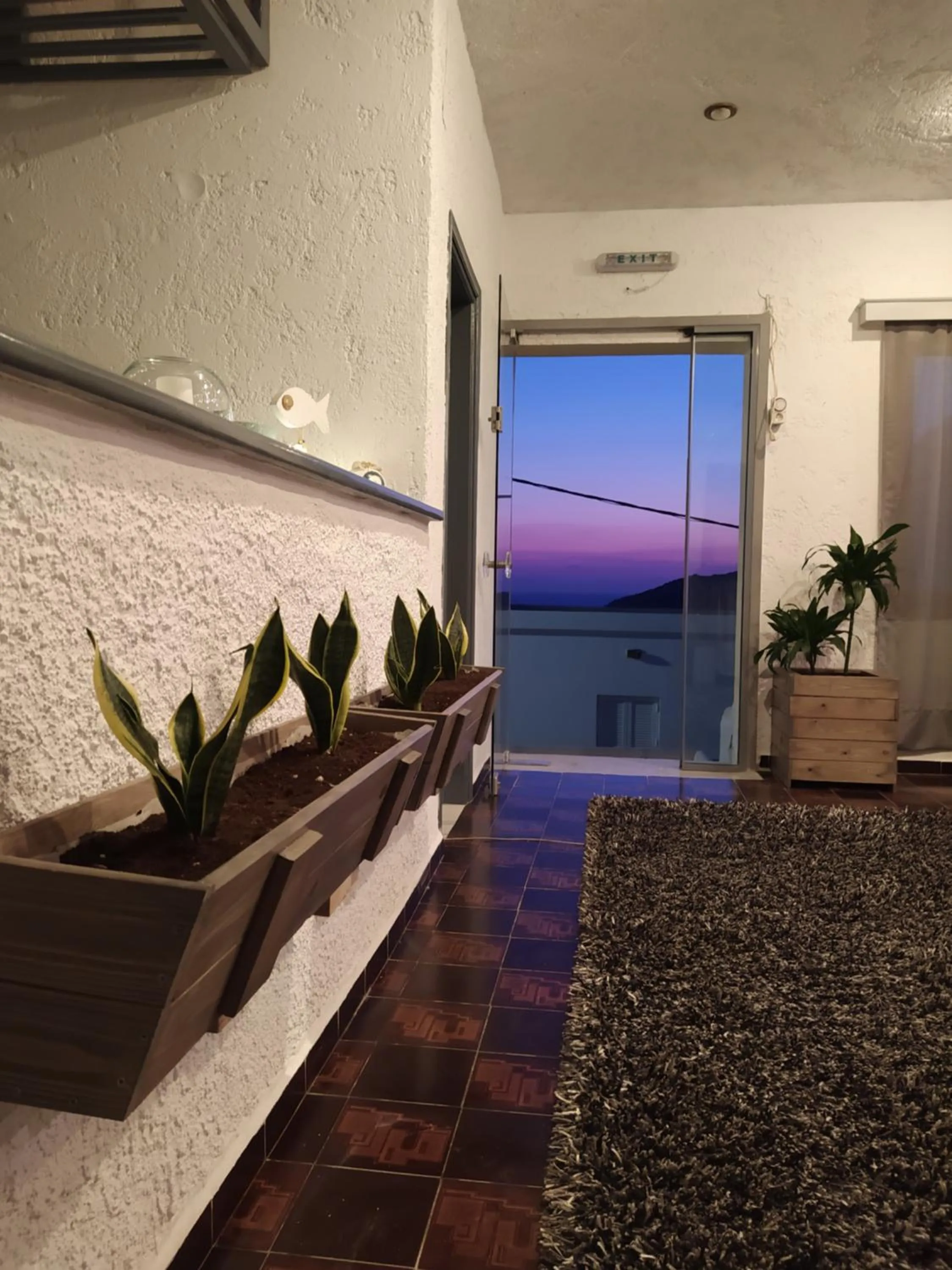 Communal lounge/ TV room in Afroditi Hotel