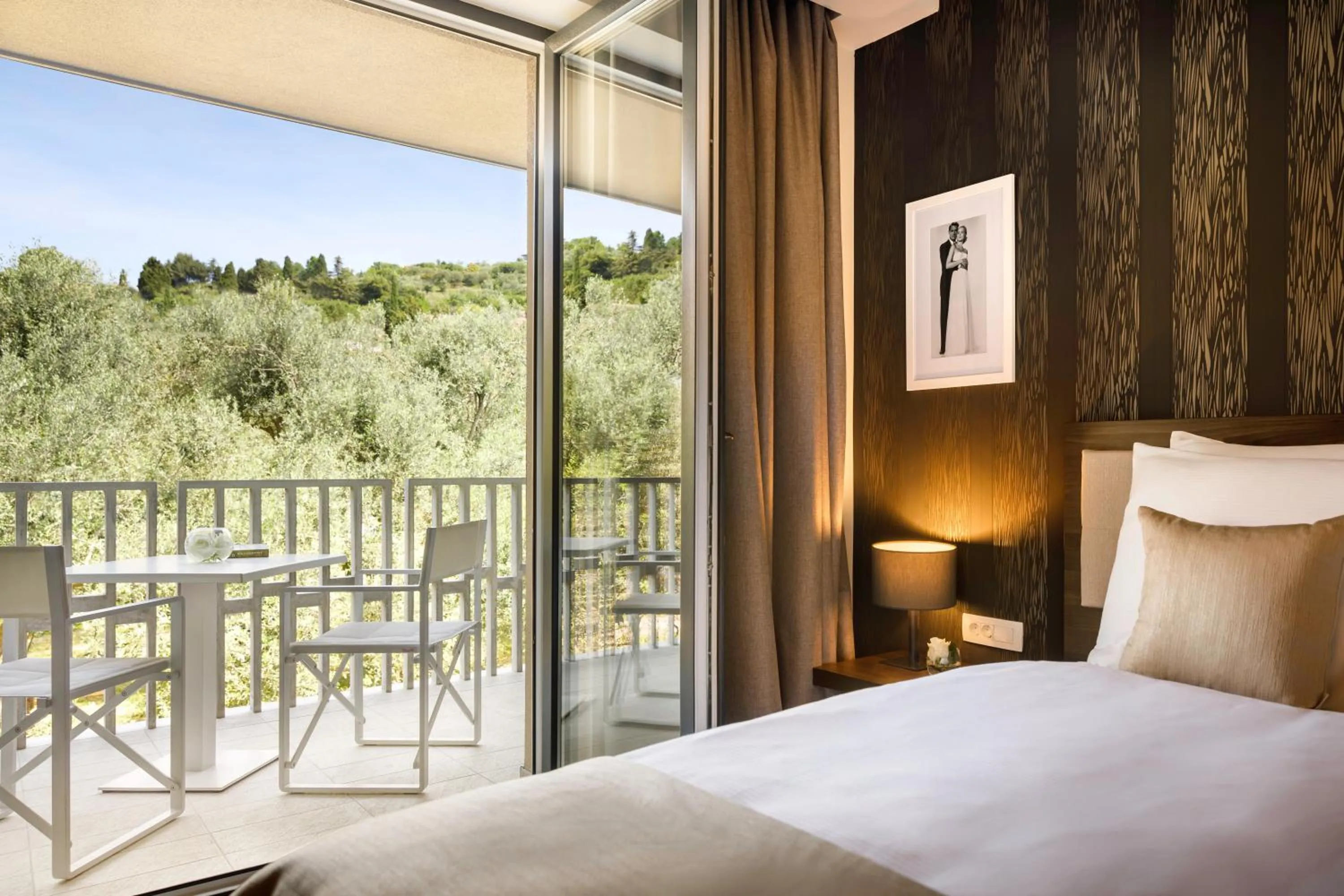 Balcony/Terrace, Bed in Remisens BEL MORETTO - Hotel Metropol Annexe