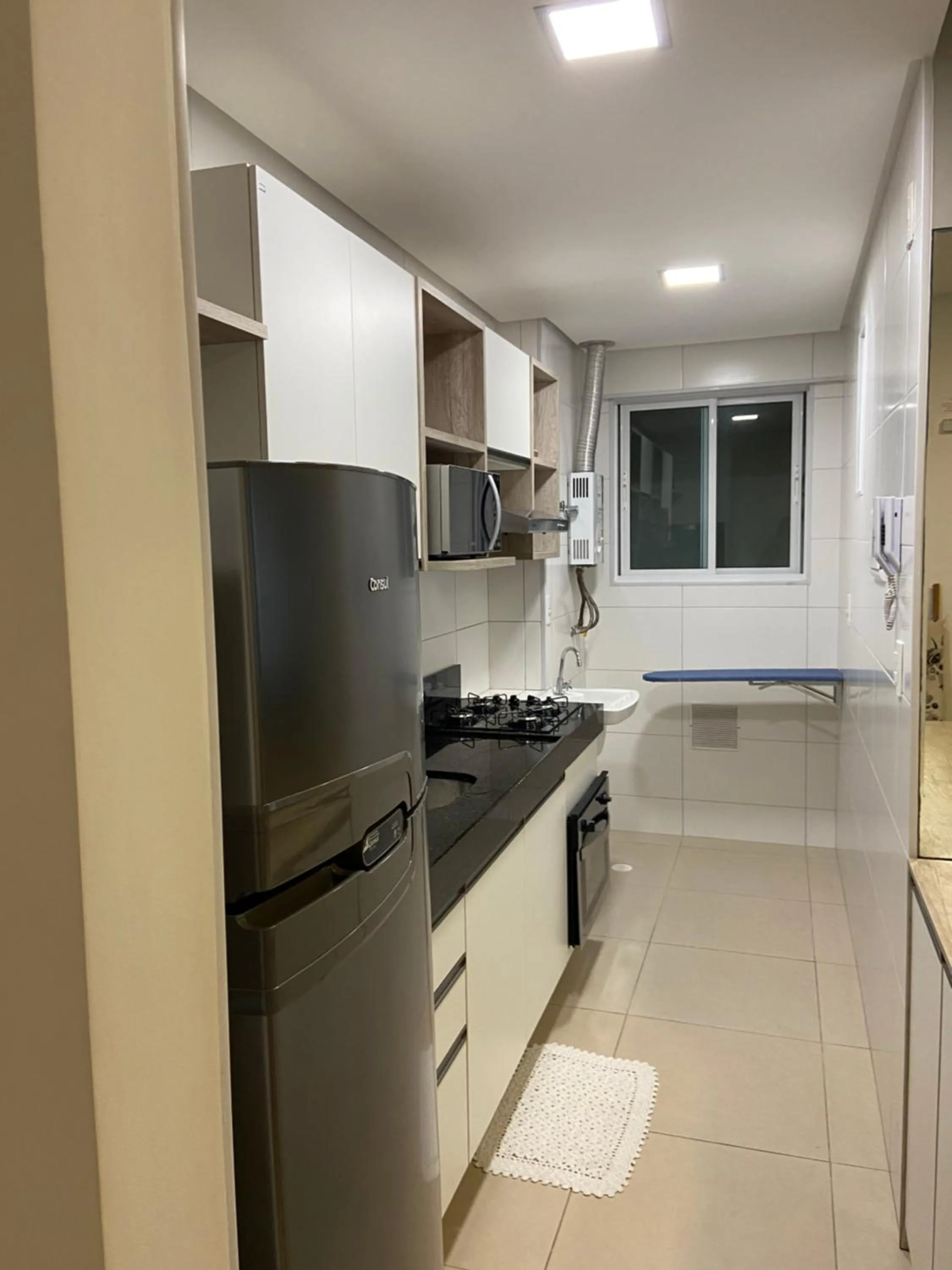 Kitchen or kitchenette in Apto Promenade I PONTA VERDE