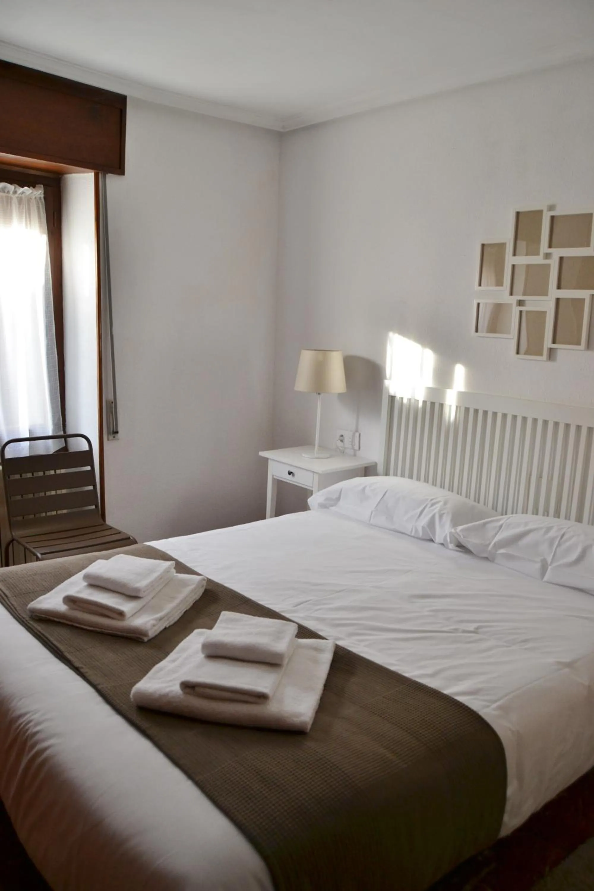Photo of the whole room, Bed in Tres Puentes Anguiano Apartamentos y Hostal