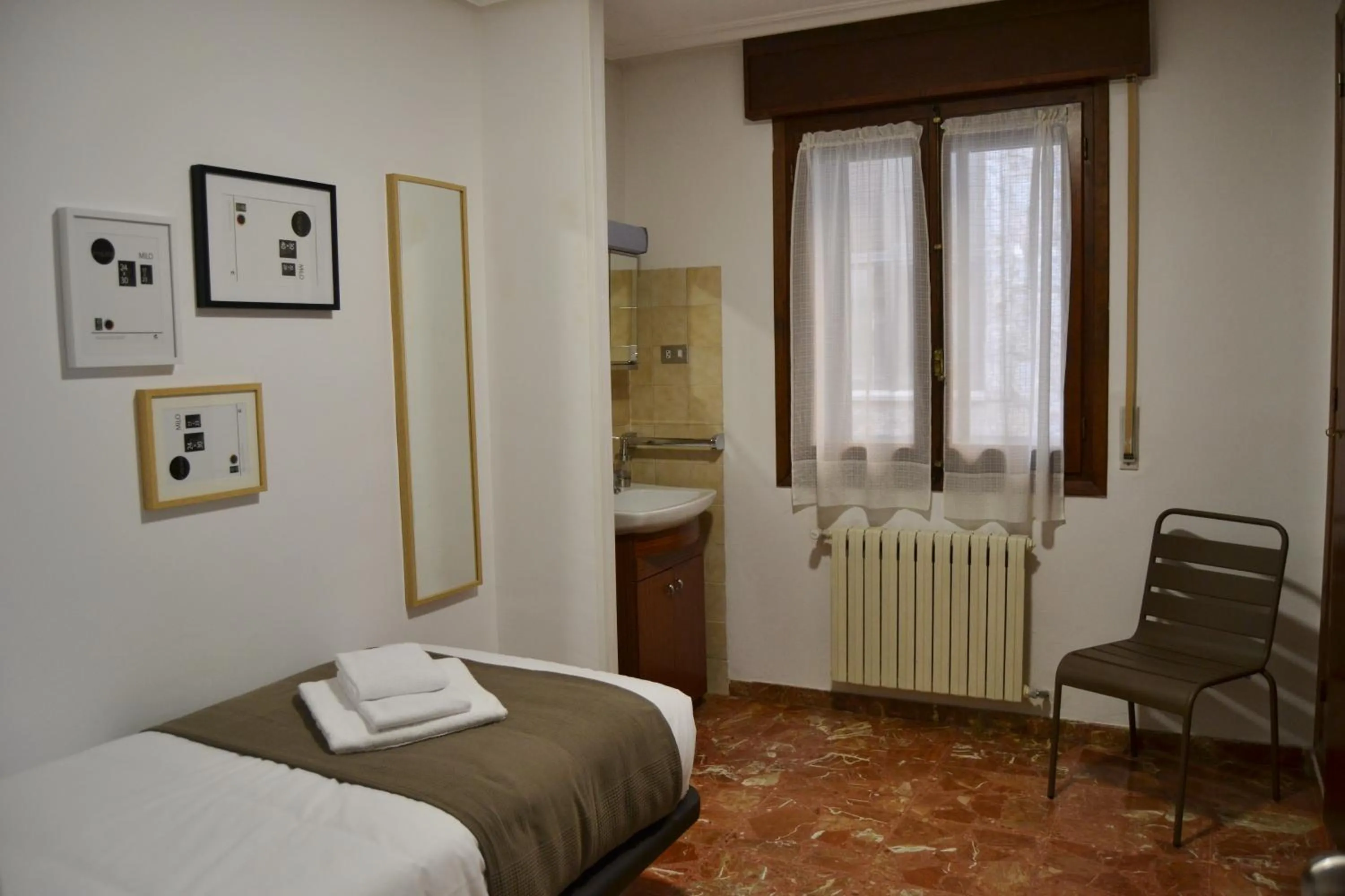 Photo of the whole room, Bed in Tres Puentes Anguiano Apartamentos y Hostal