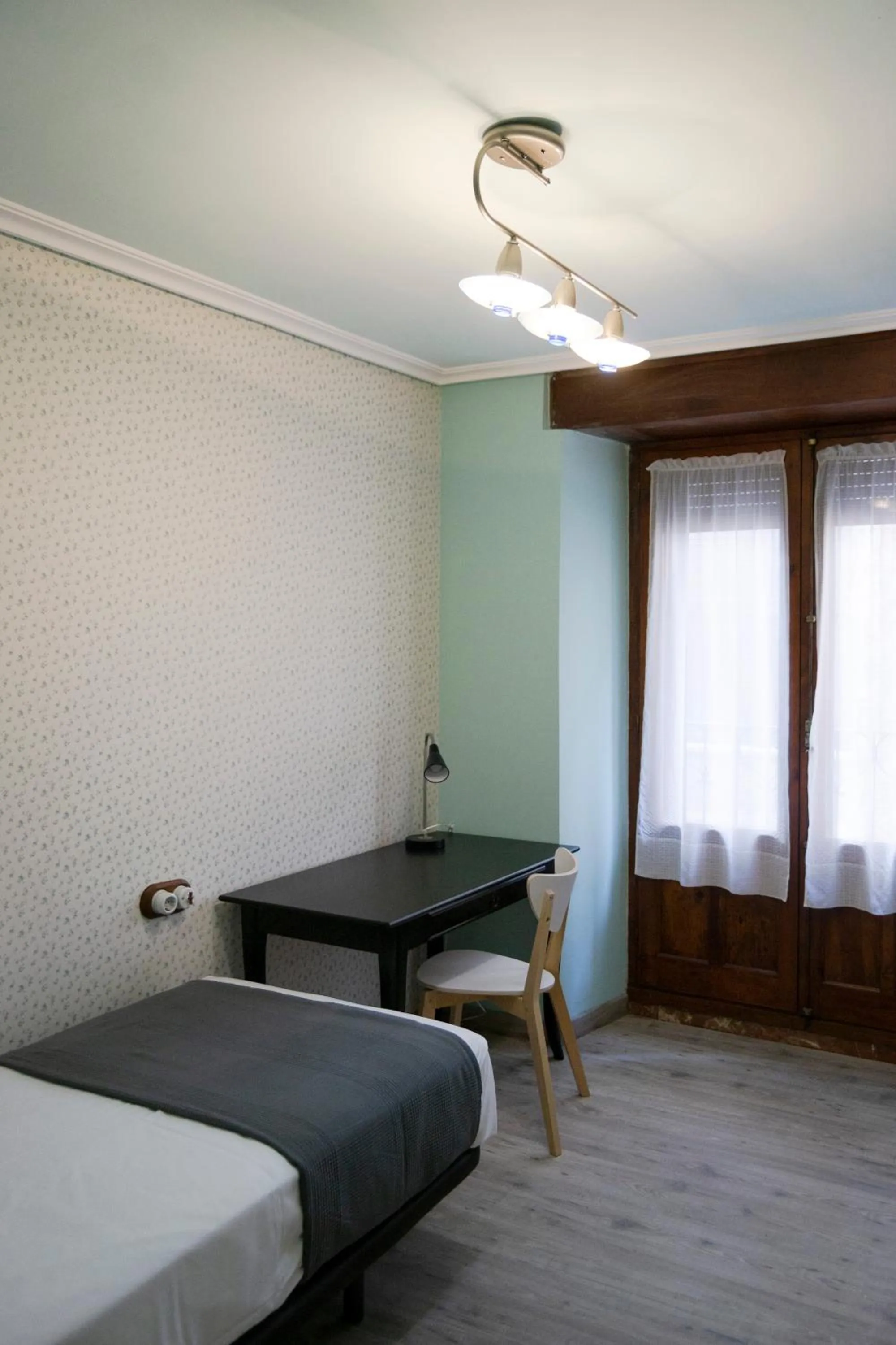 Photo of the whole room, Bed in Tres Puentes Anguiano Apartamentos y Hostal