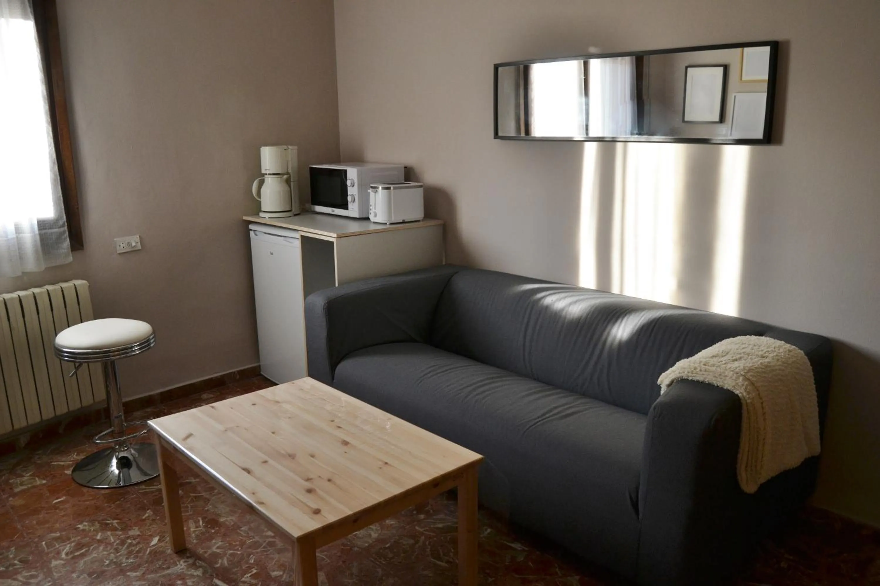 Living room in Tres Puentes Anguiano Apartamentos y Hostal