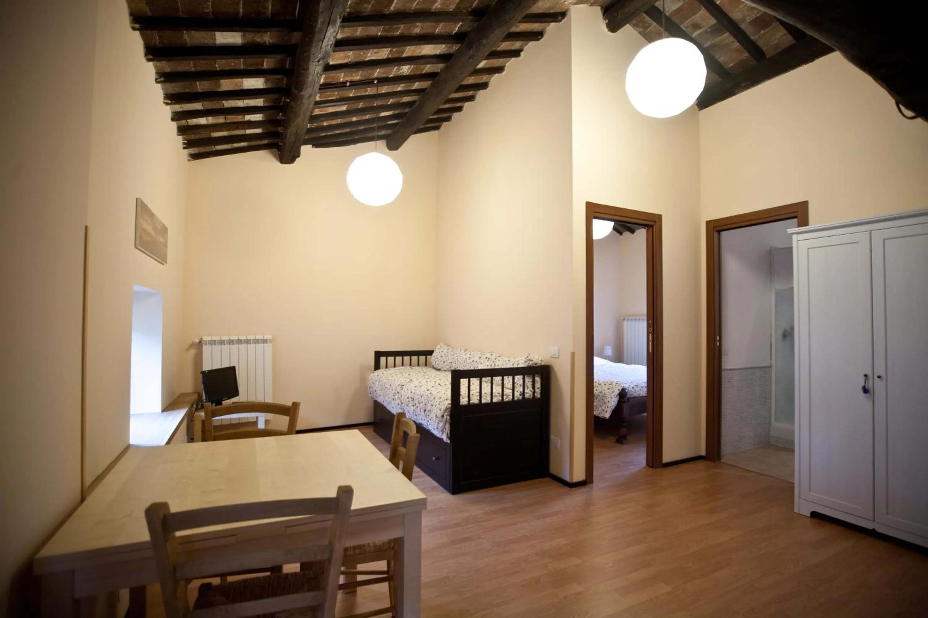 Living room, Bed in La Soffitta e La Torre