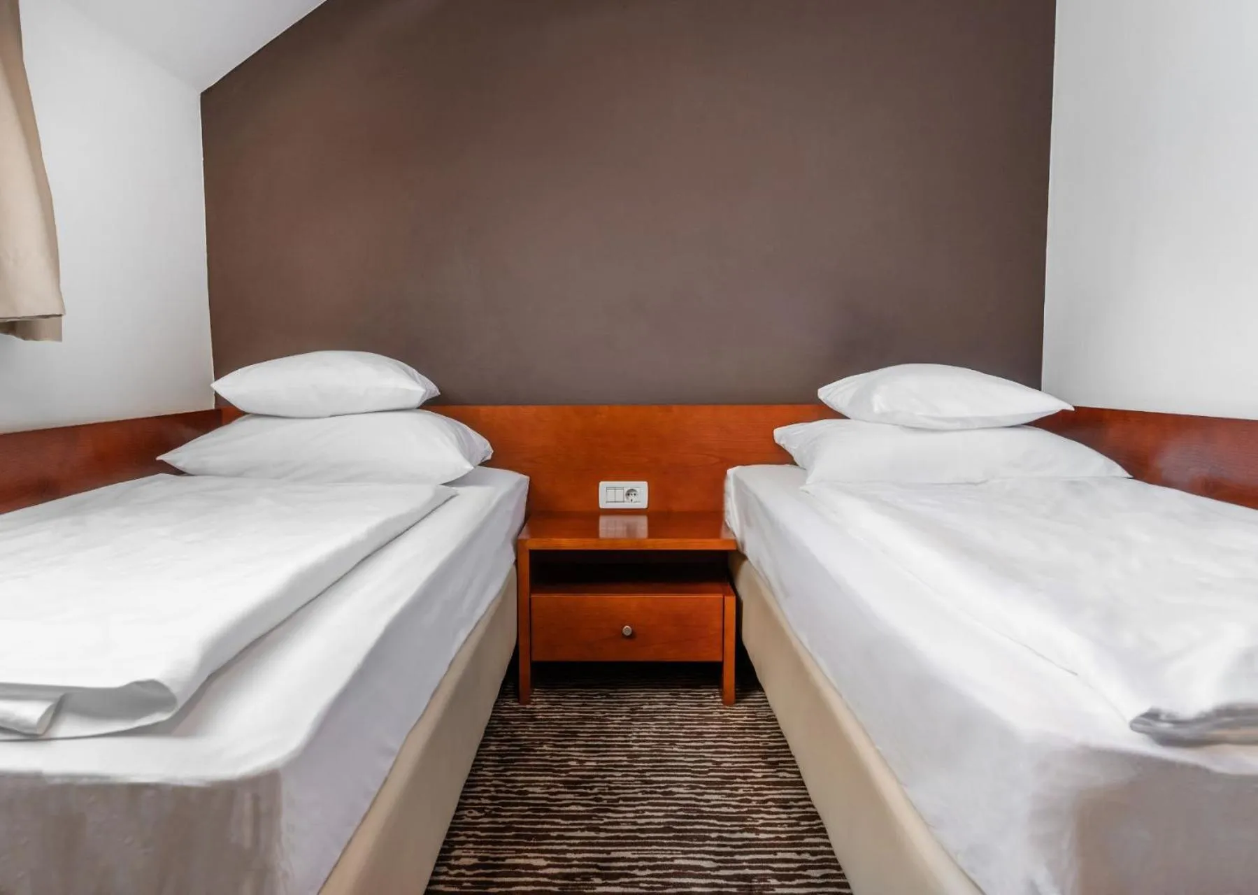 Bed in Hotel Kranjska Gora