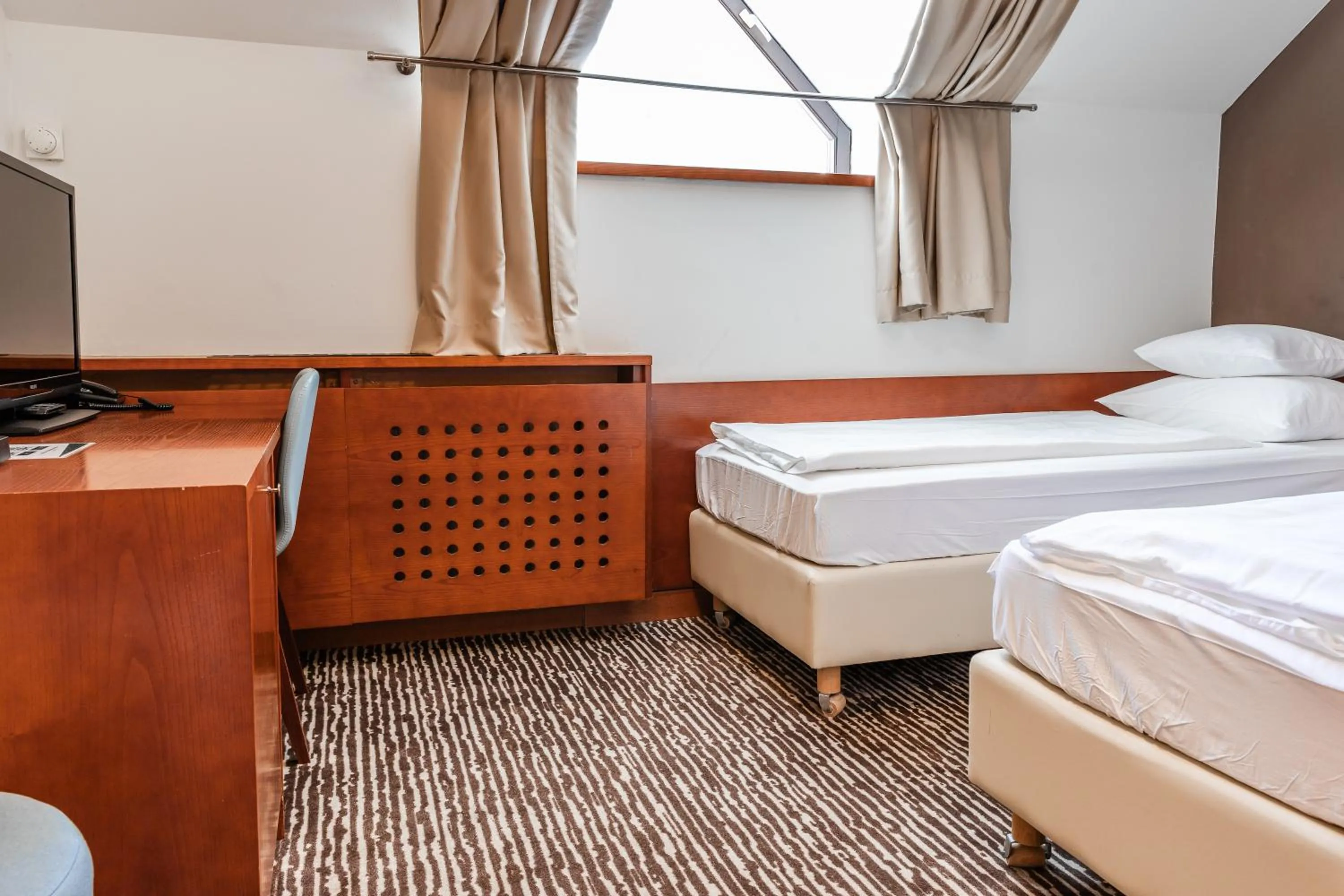 Bed in Hotel Kranjska Gora