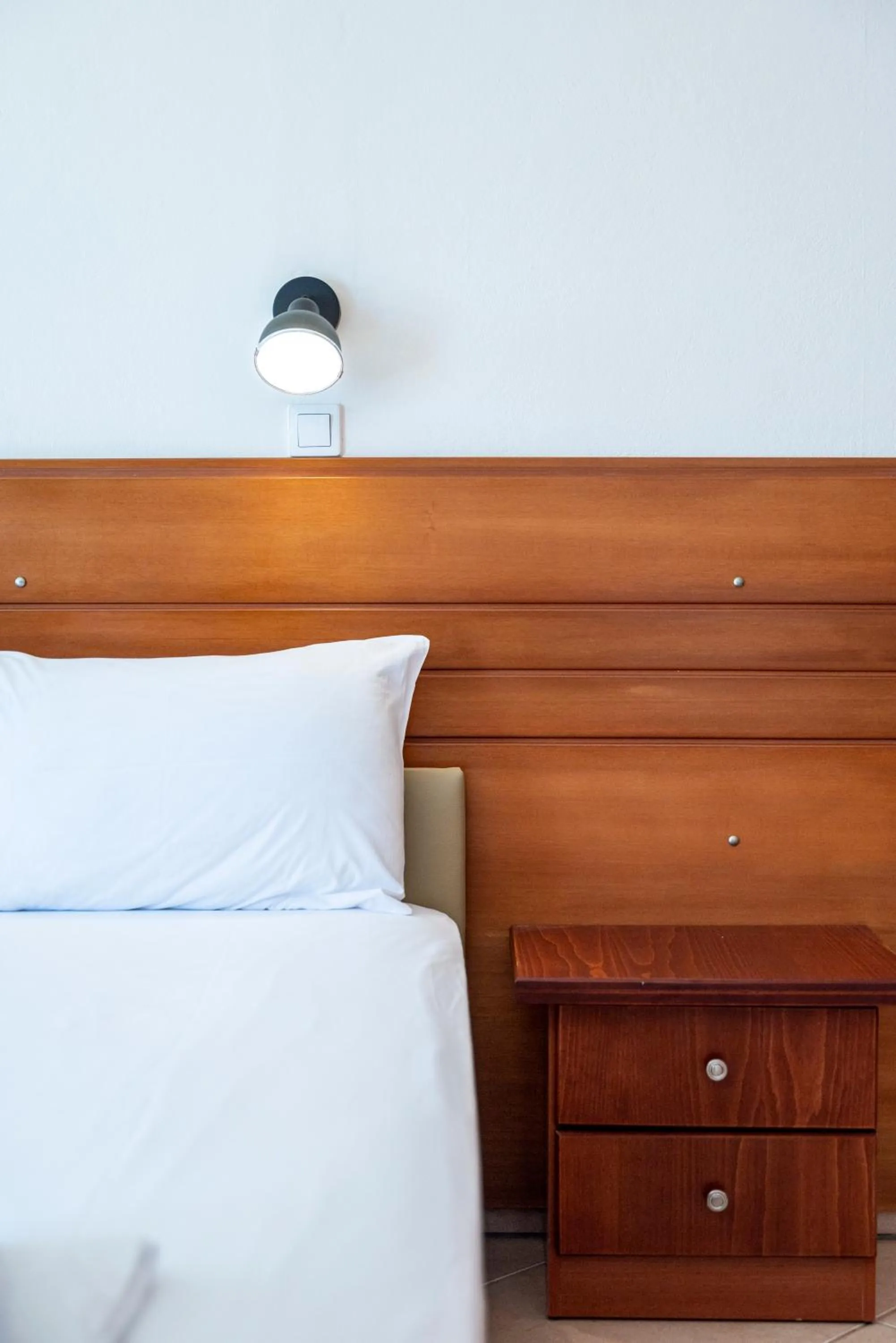 Bed in Mammis Beach Hotel