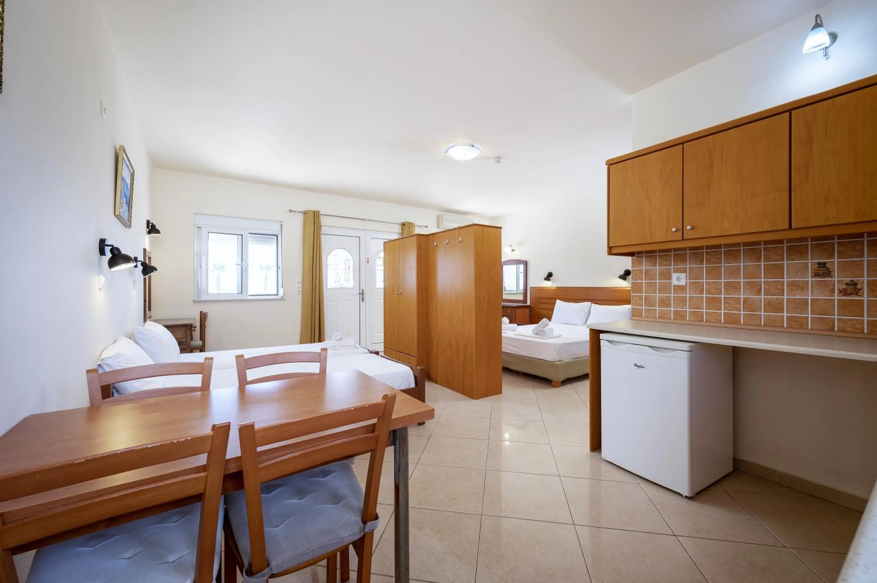 Bed in Mammis Beach Hotel