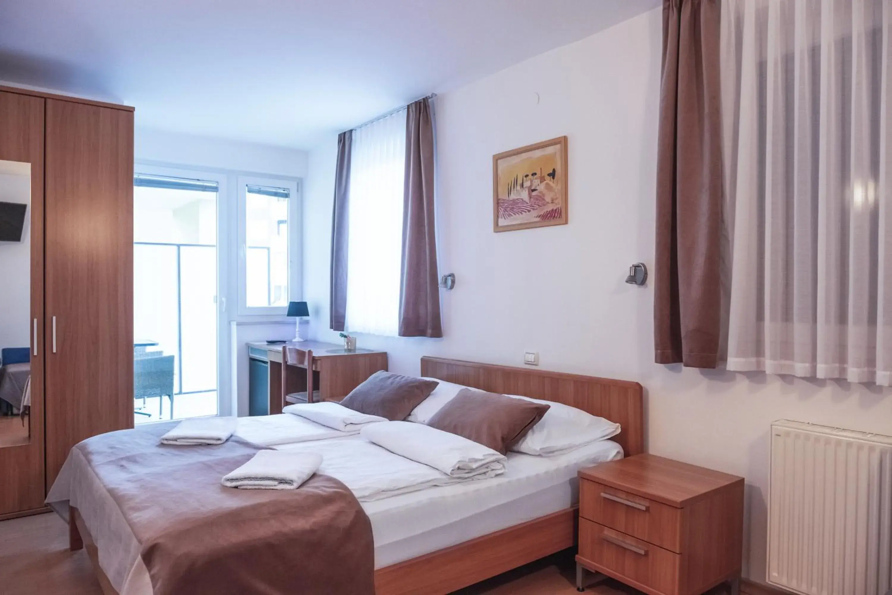 Quadruple Room with Balcony in Garni Hotel Keltika Quadruple Room with Balcony in Garni Hotel Keltika