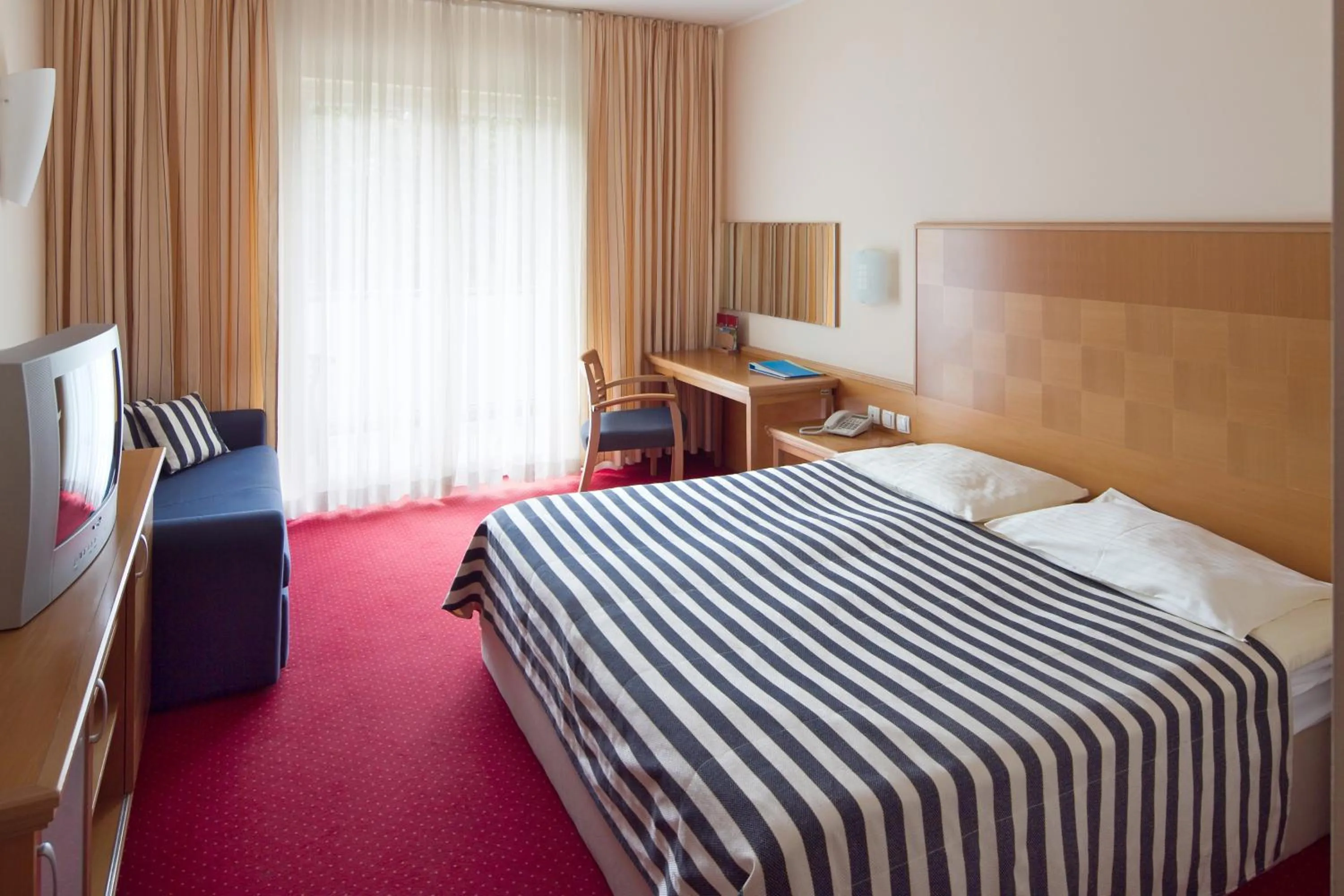 Bed in Ramada Hotel & Suites Kranjska Gora