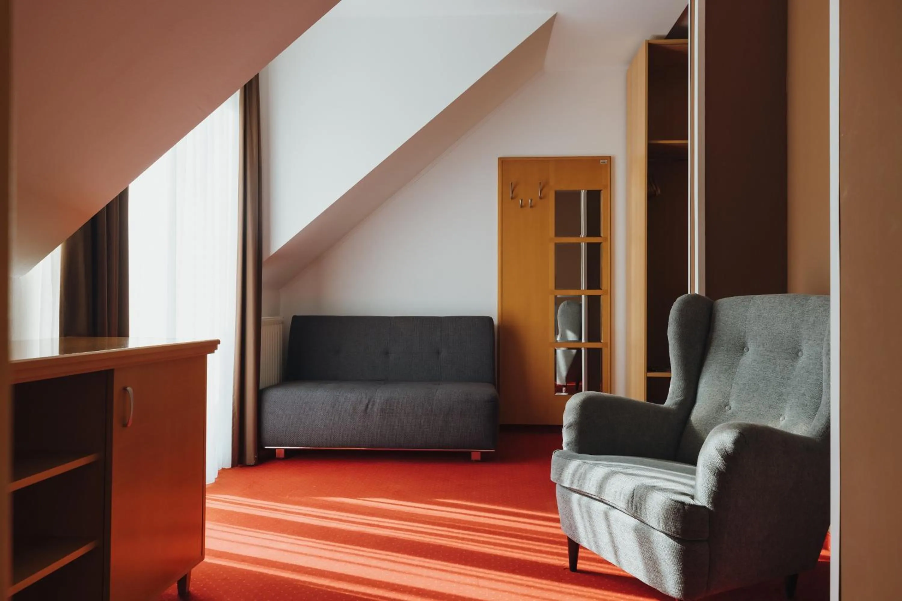 Living room in Ramada Hotel & Suites Kranjska Gora