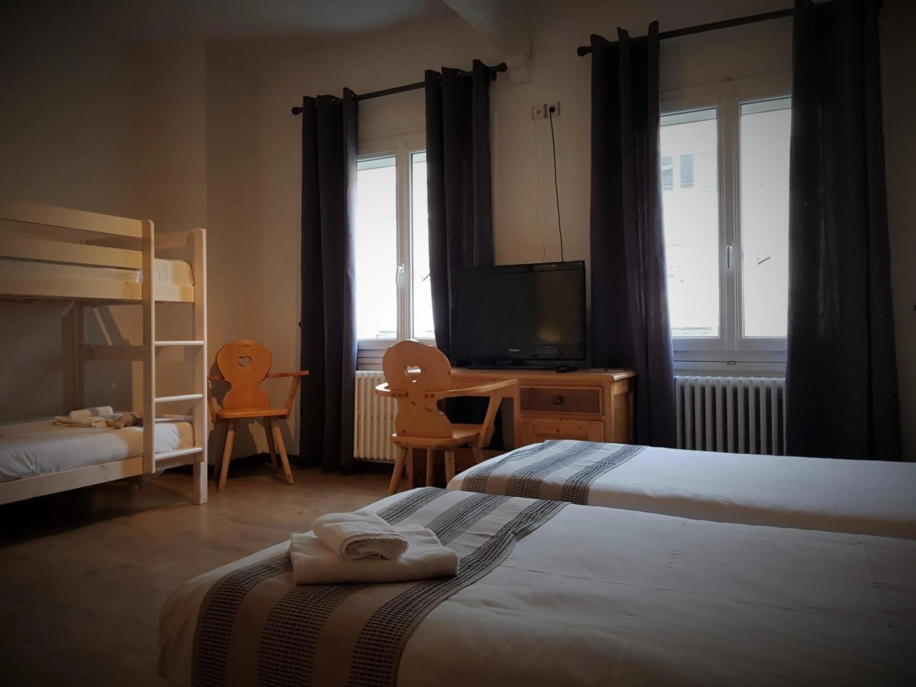 Bed in Savoy Hotel & Restaurant