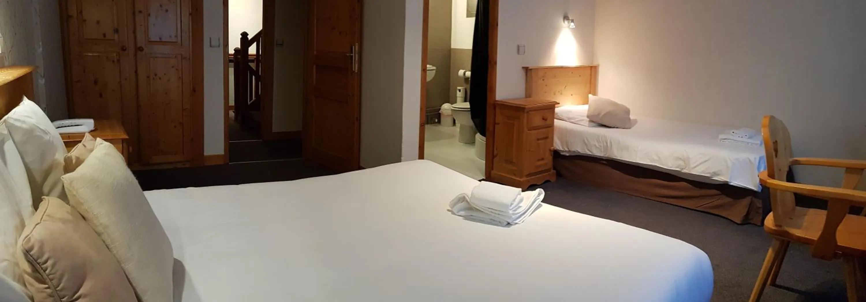 Photo of the whole room, Bed in Savoy Hotel & Restaurant