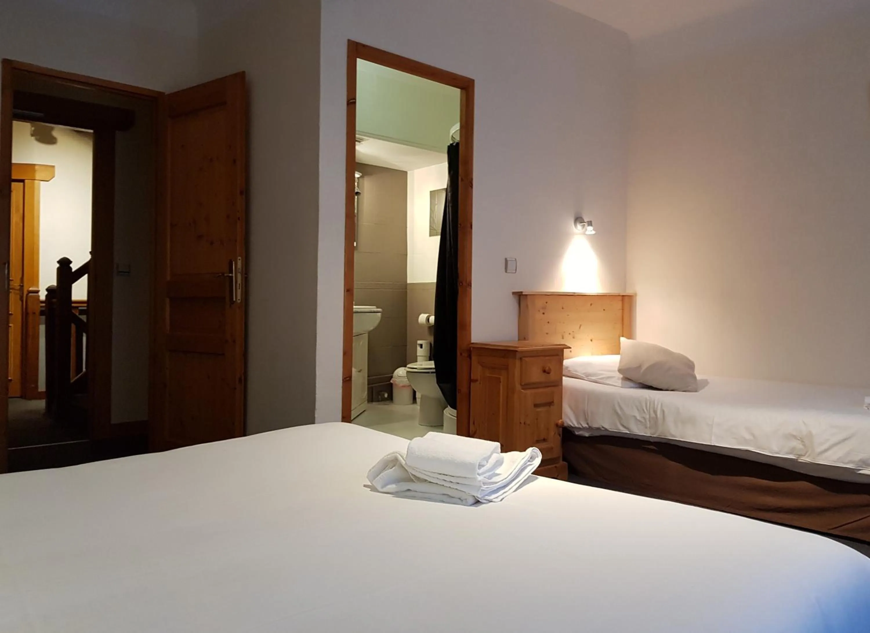 Bed in Savoy Hotel & Restaurant