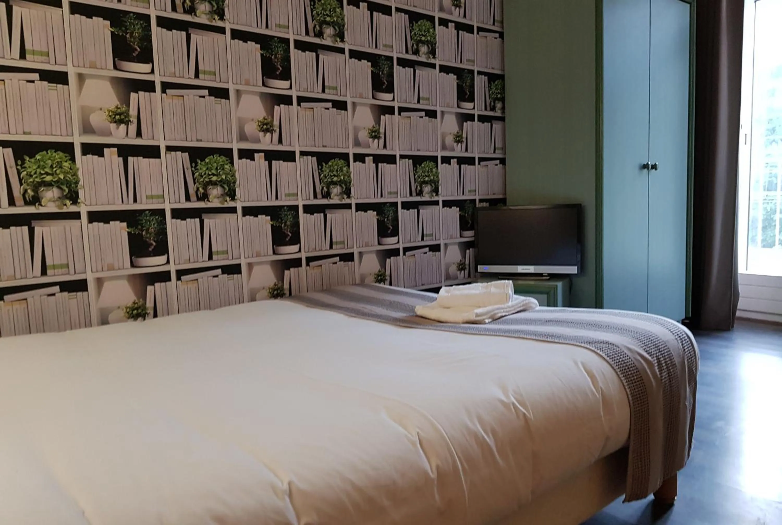 Bed in Savoy Hotel & Restaurant