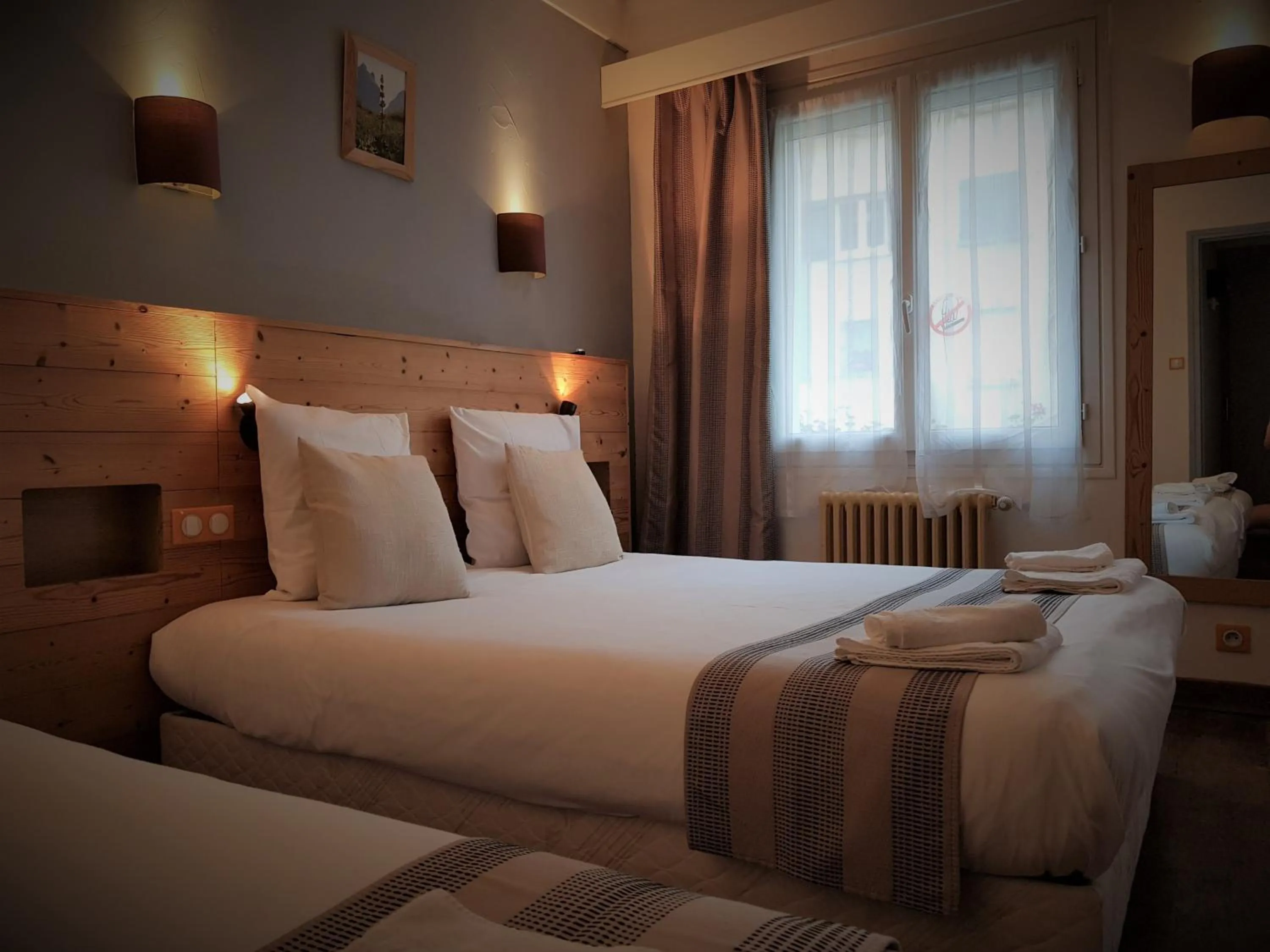 Photo of the whole room, Bed in Savoy Hotel & Restaurant