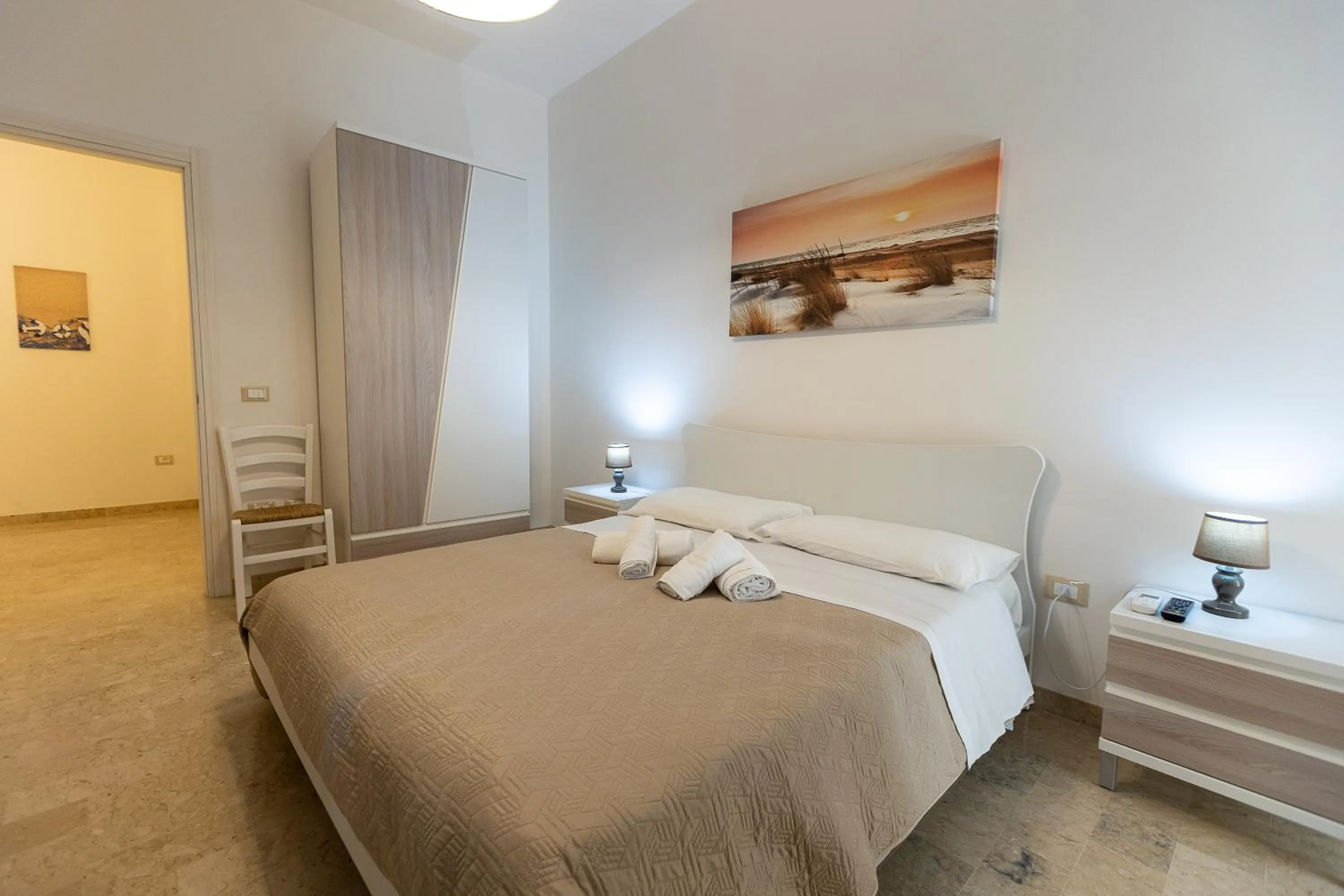 Bed in La Rosa Dei Venti - Free Parking, Air Conditioning and Wi-Fi