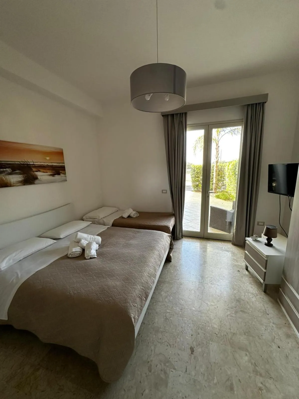 Bed in La Rosa Dei Venti - Free Parking, Air Conditioning and Wi-Fi