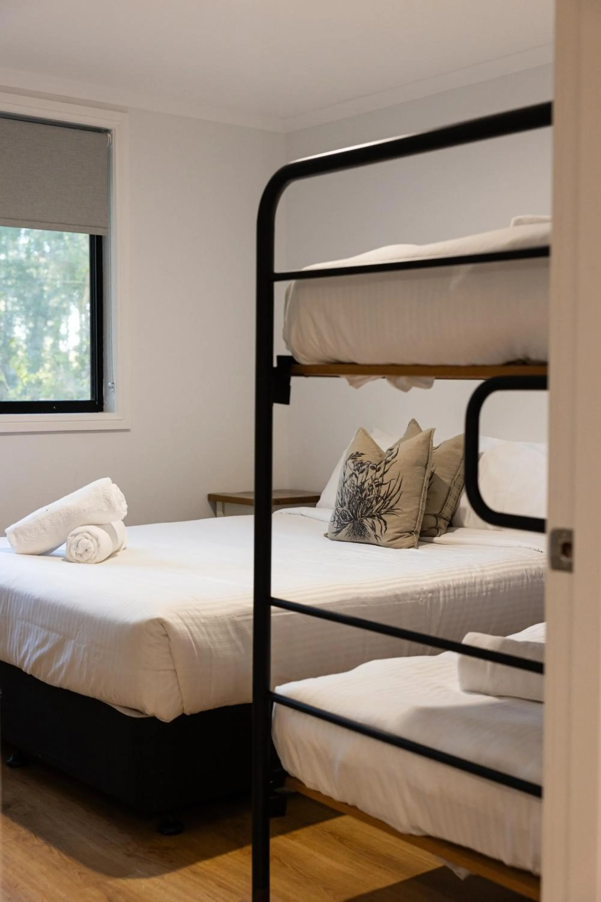 Bed in Pokolbin Cottages