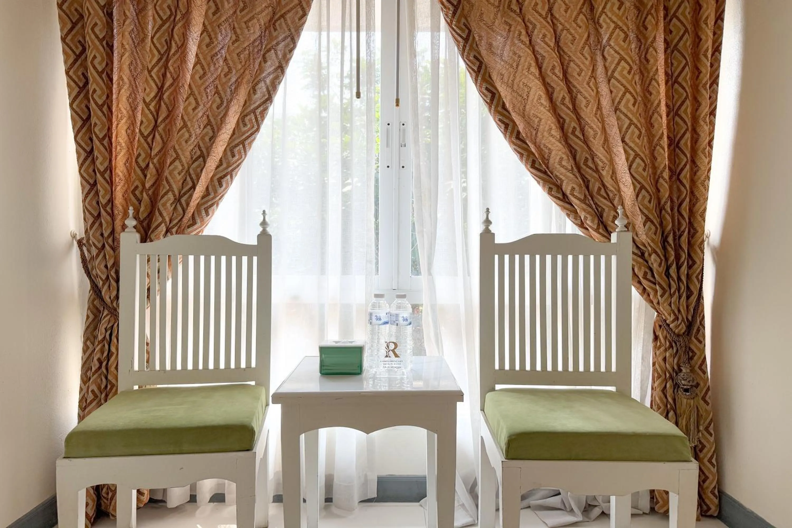 Seating area in Rasa Boutique Hotel Chiang Rai