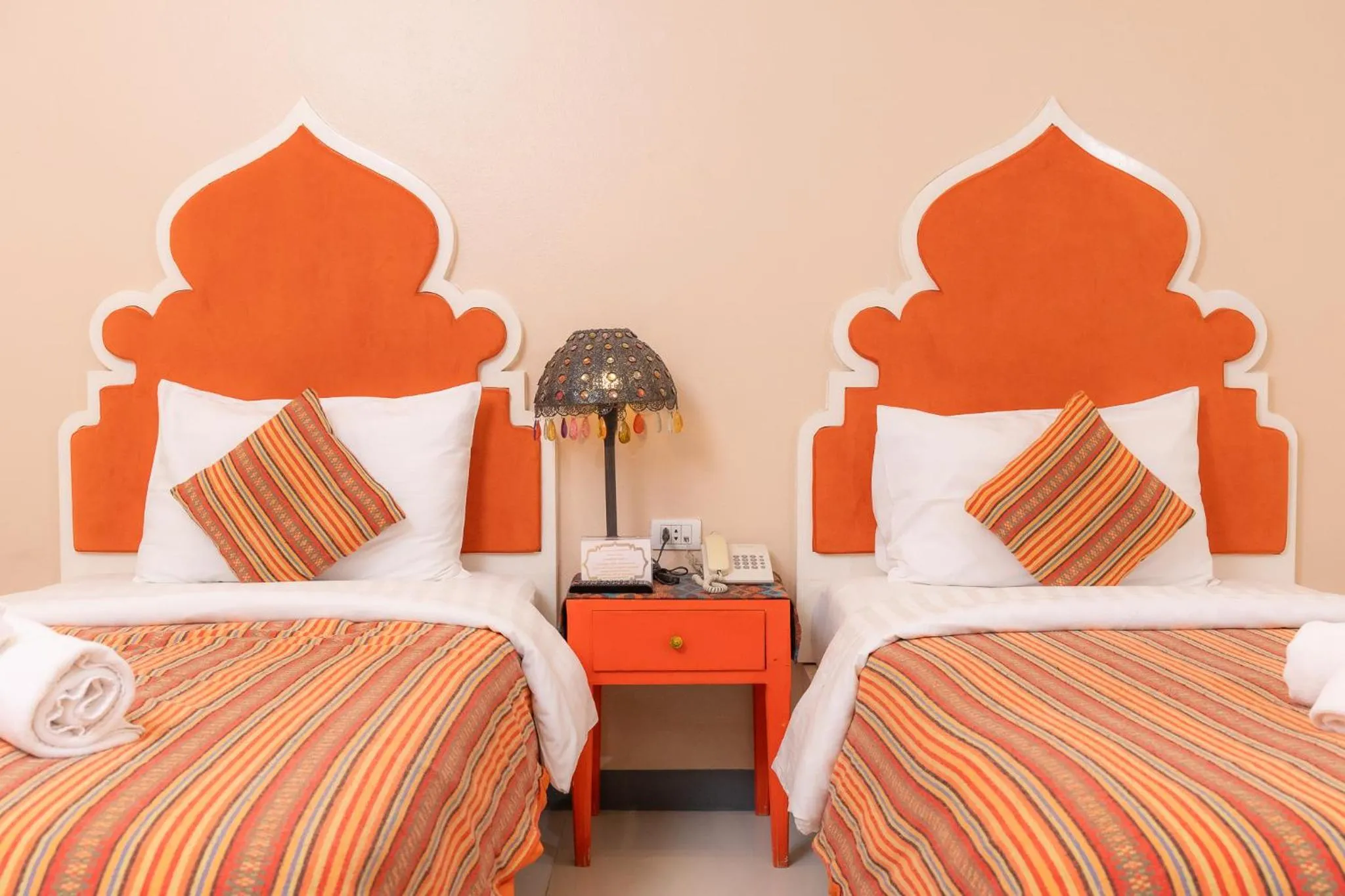 Bed in Rasa Boutique Hotel Chiang Rai