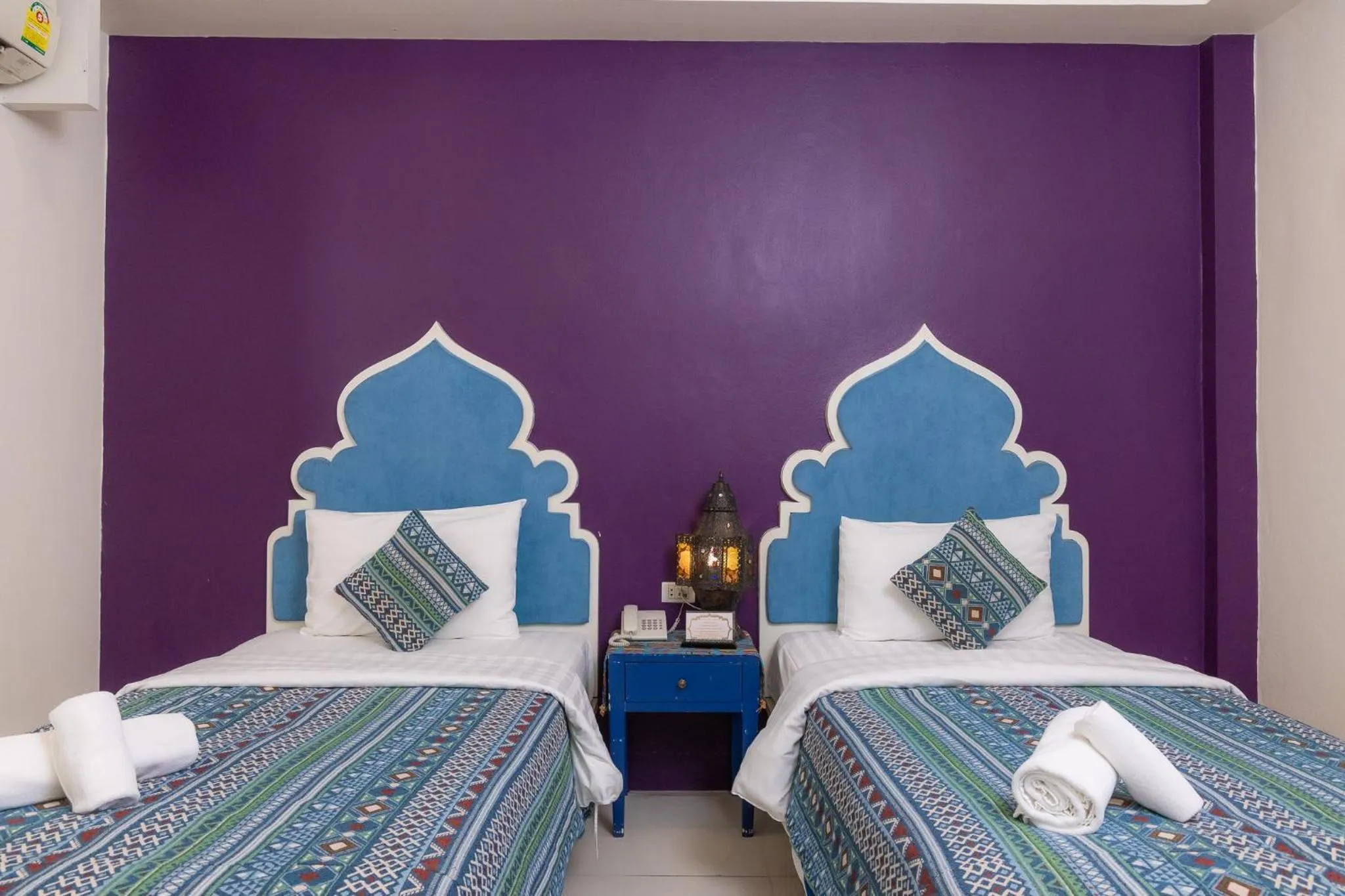 Bed in Rasa Boutique Hotel Chiang Rai