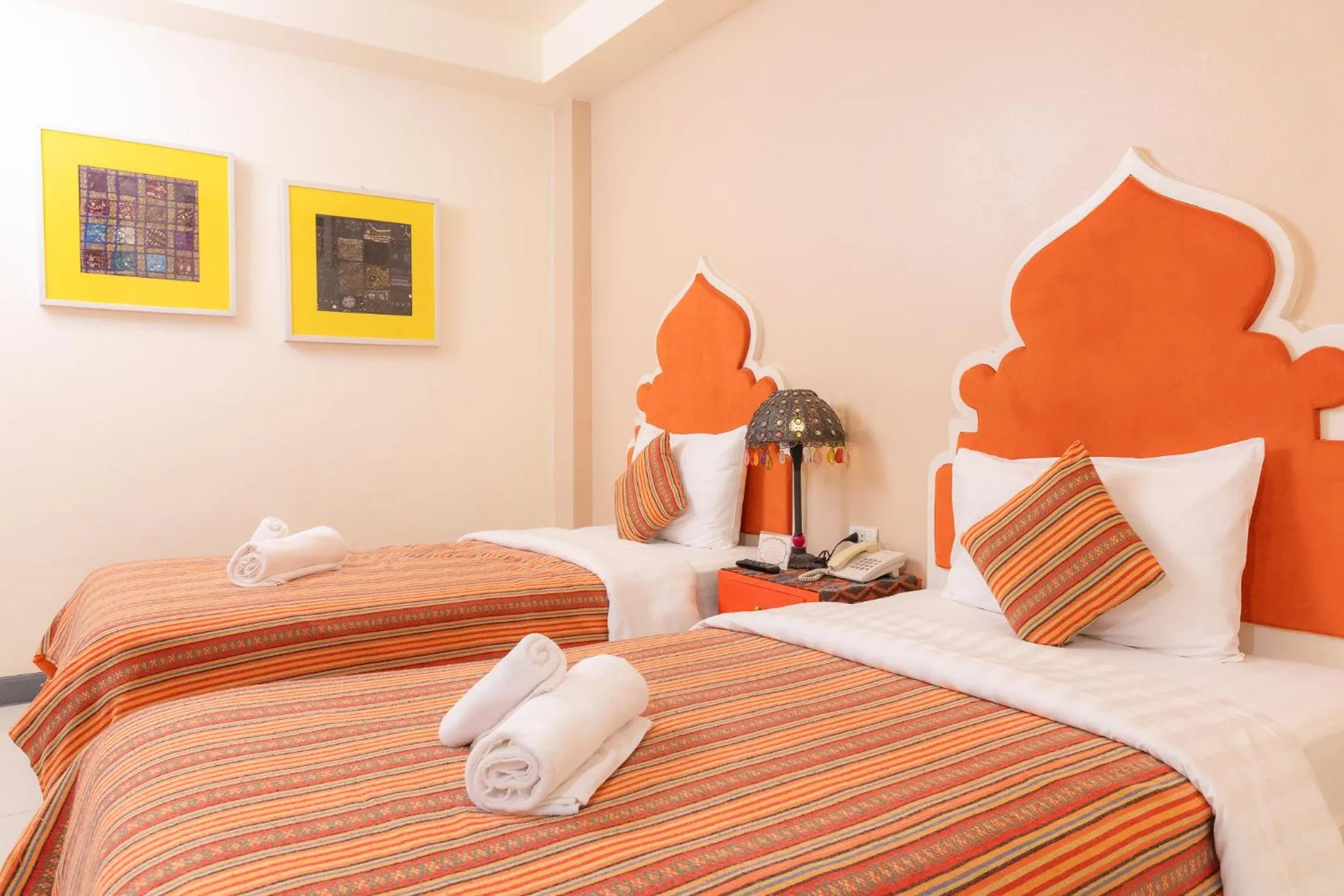 Bed in Rasa Boutique Hotel Chiang Rai