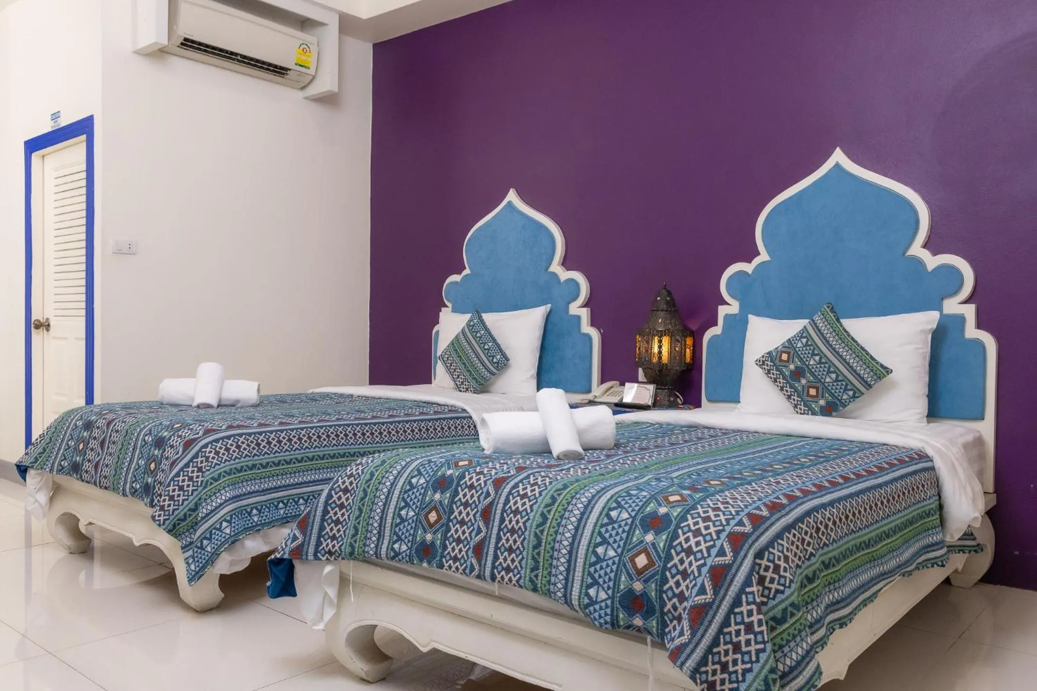 Bed in Rasa Boutique Hotel Chiang Rai