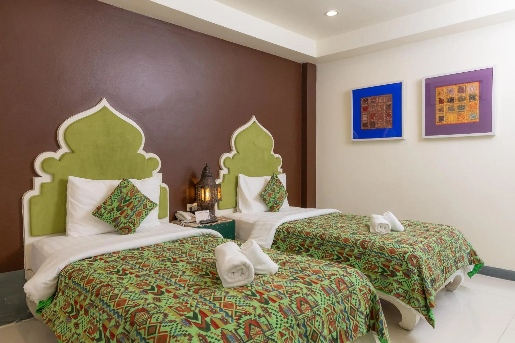 Bed in Rasa Boutique Hotel Chiang Rai