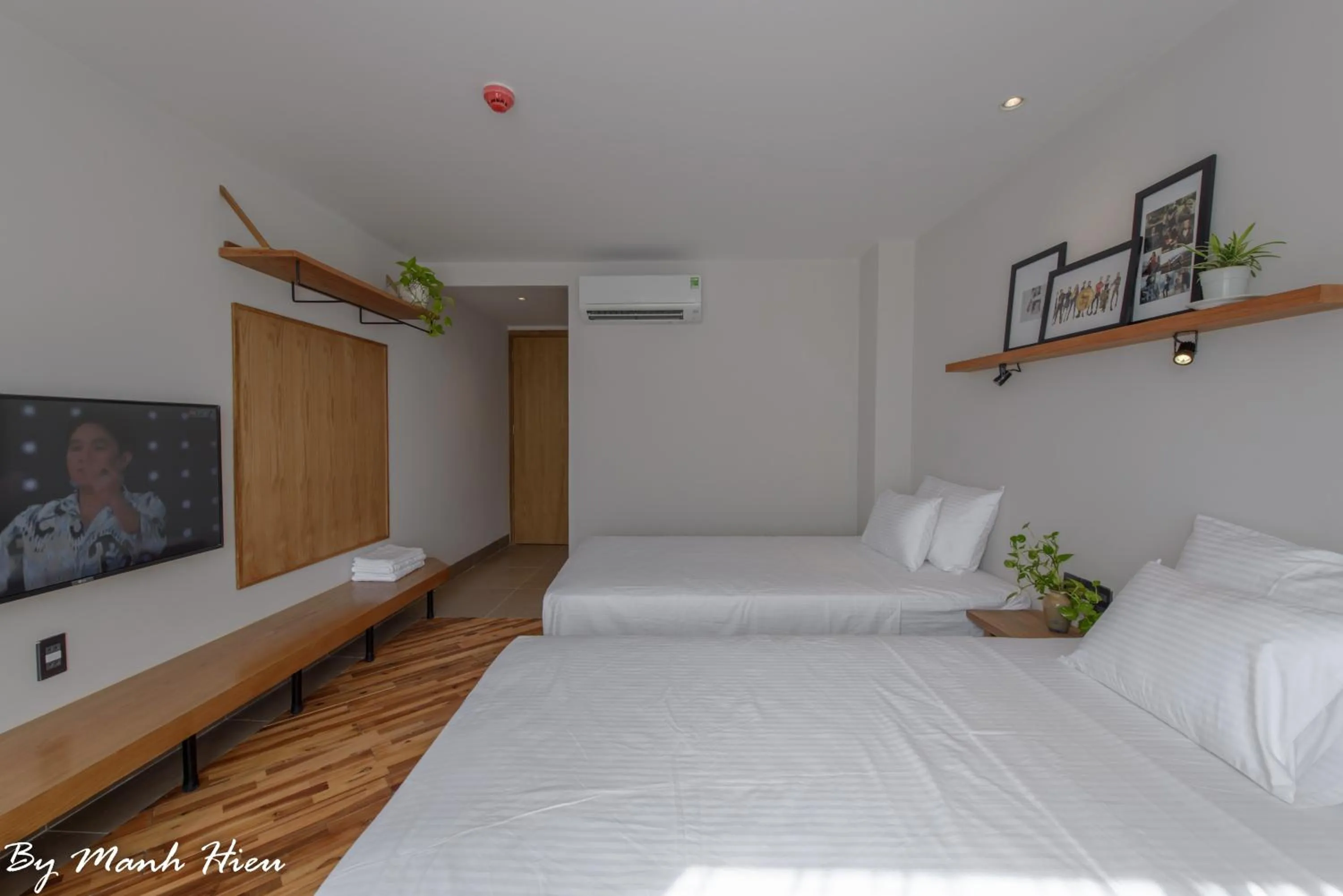 Bed in Mojzo Inn Boutique Hotel