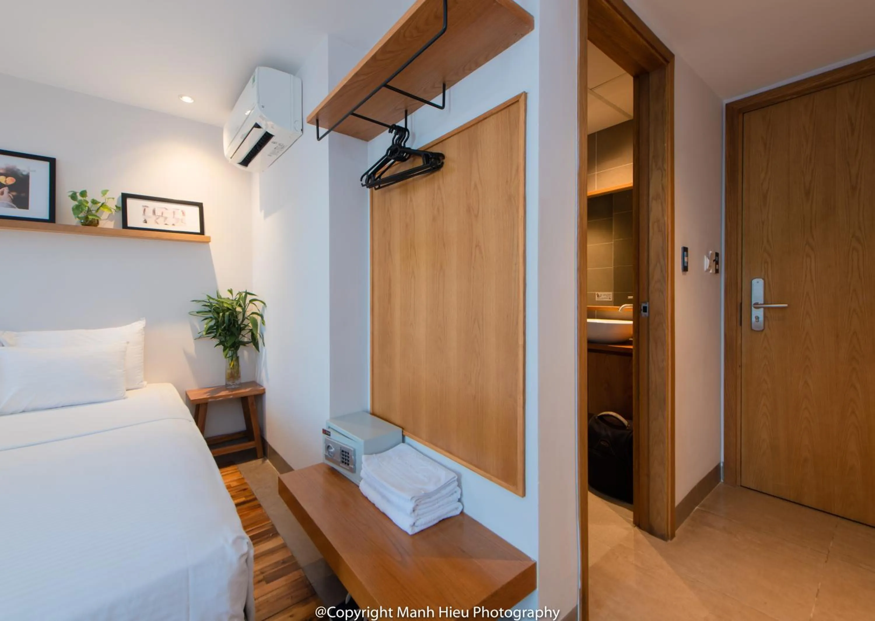 Bed in Mojzo Inn Boutique Hotel